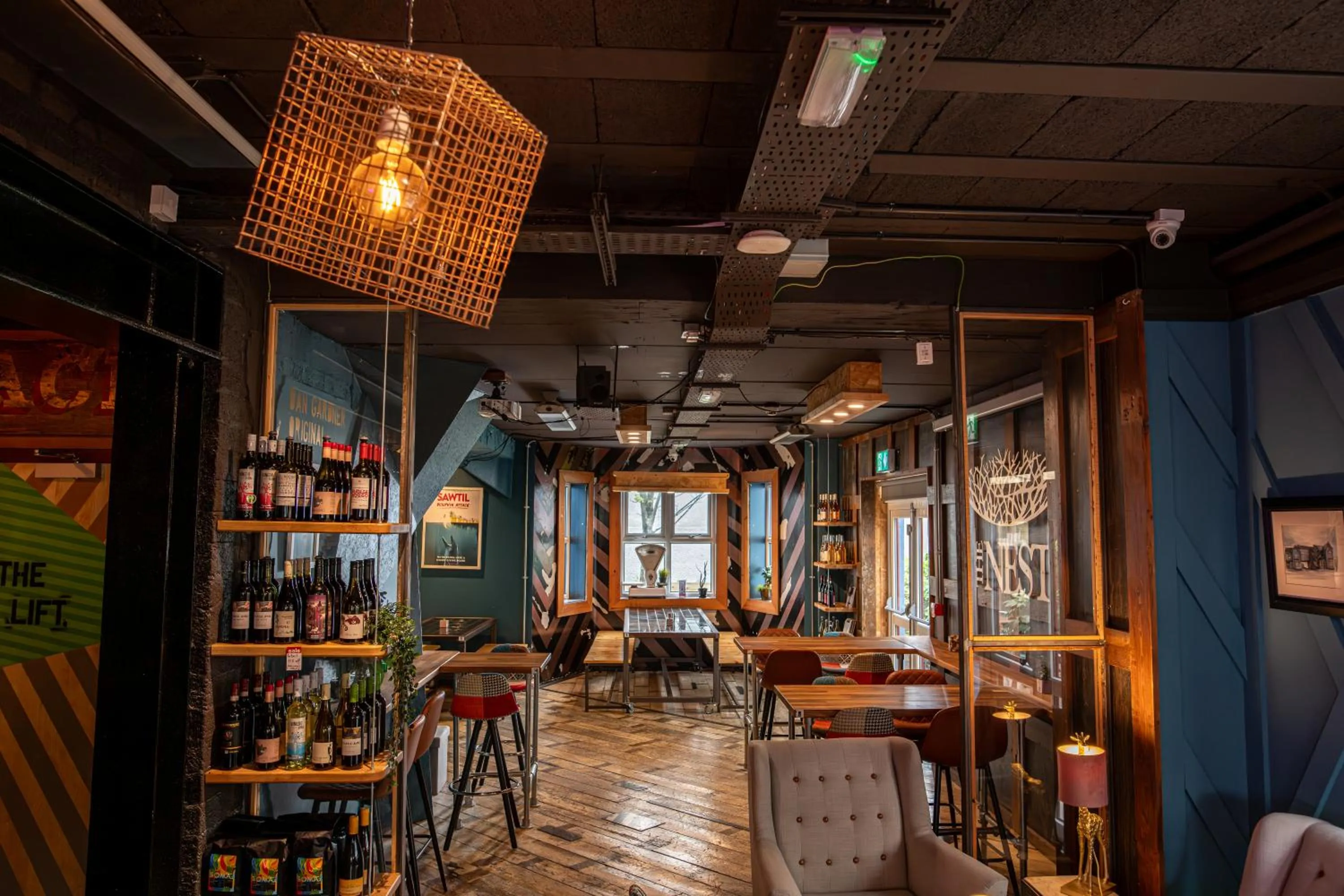 Communal lounge/ TV room in The Nest Boutique Hostel