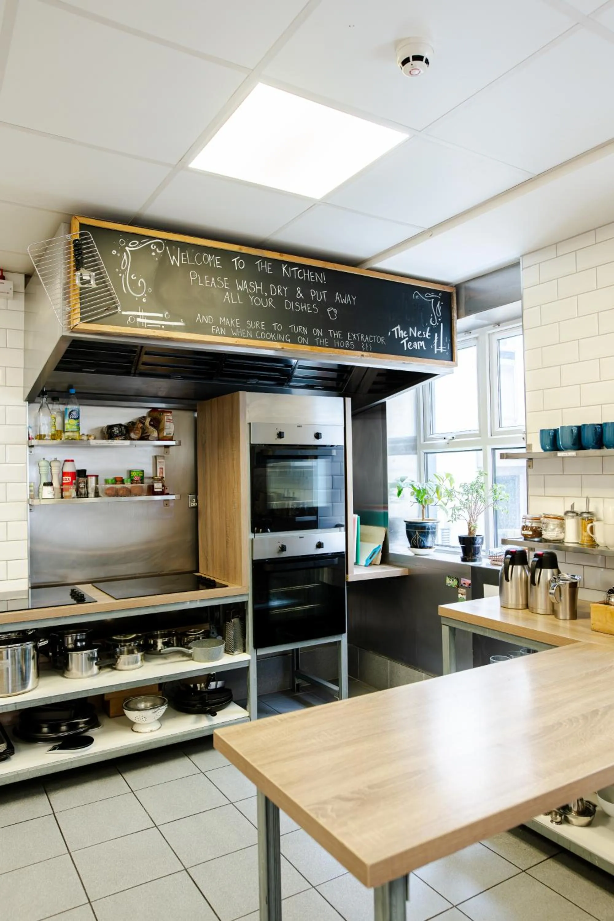 Communal kitchen in The Nest Boutique Hostel