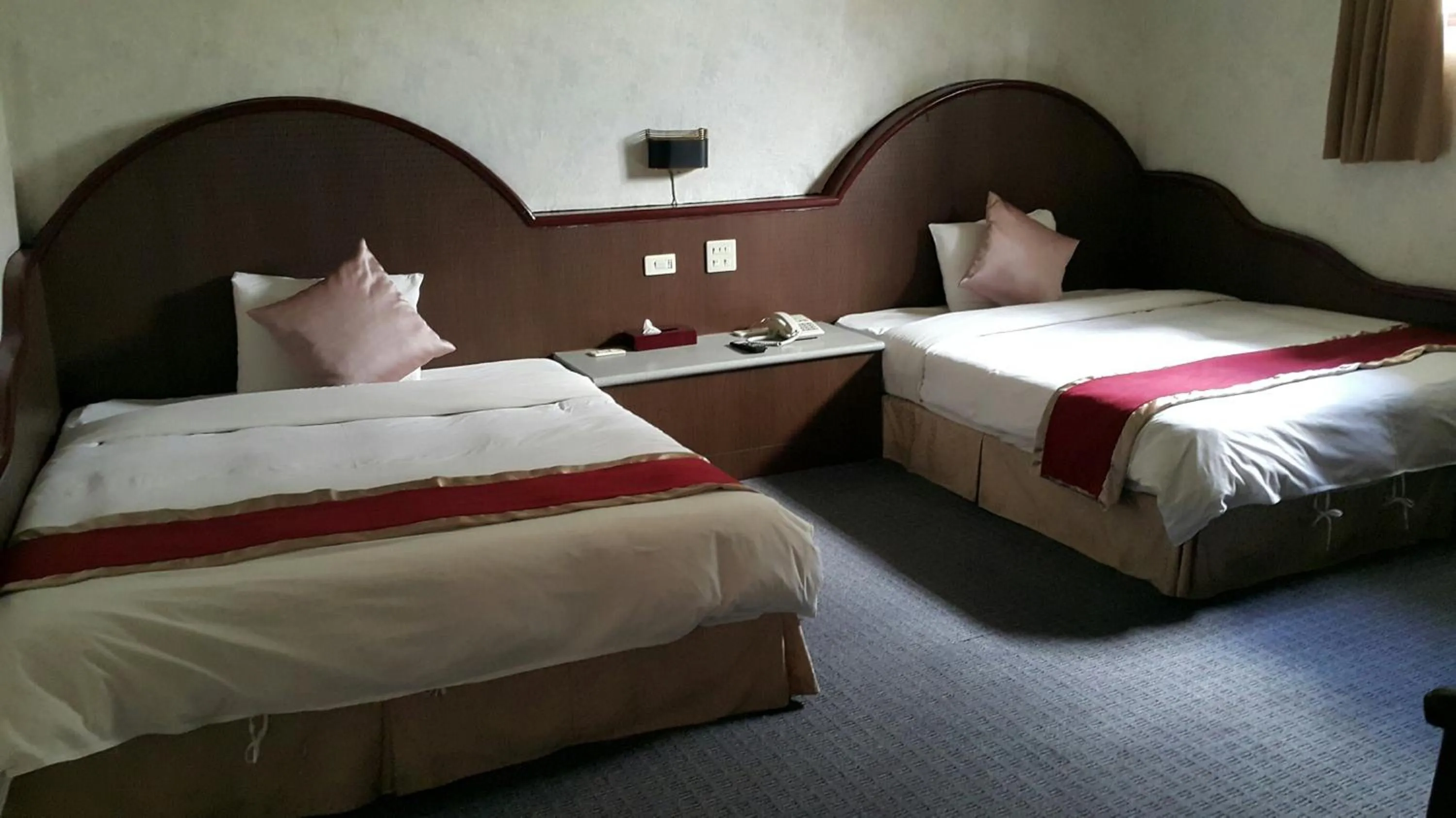 Bed in Mei Hua Hotel