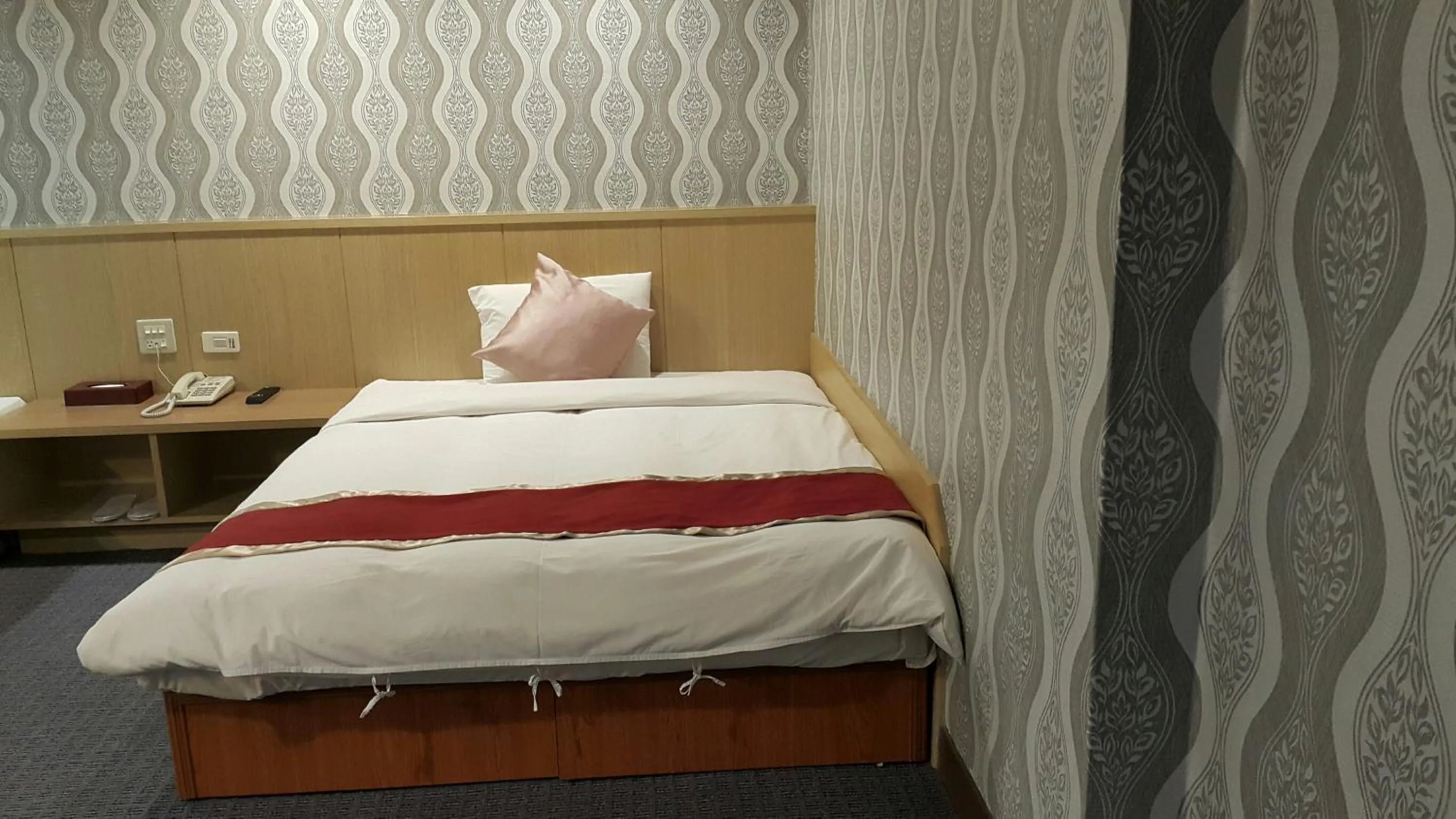 Bed in Mei Hua Hotel