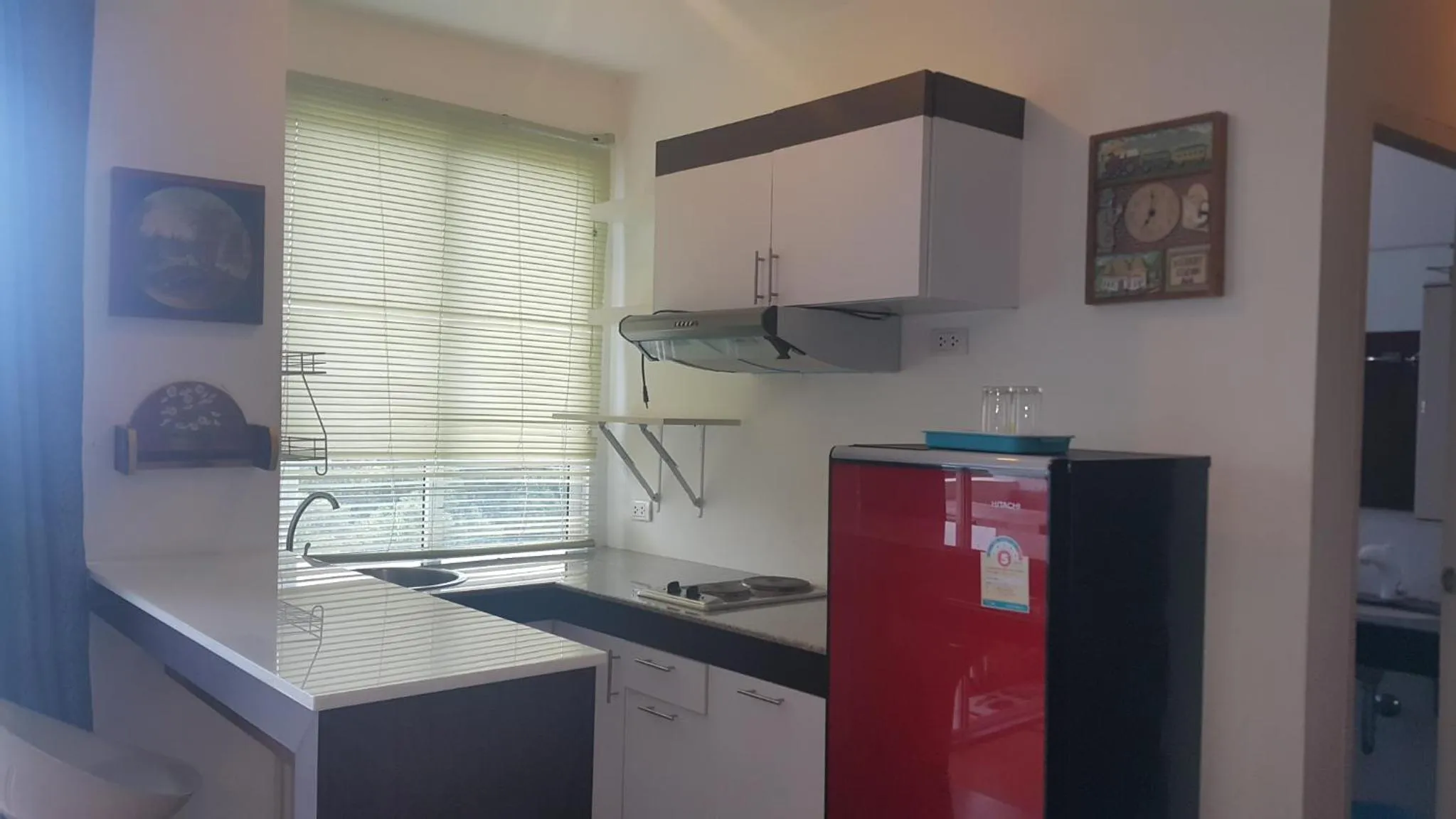 Kitchen or kitchenette in Banchaitalay Room