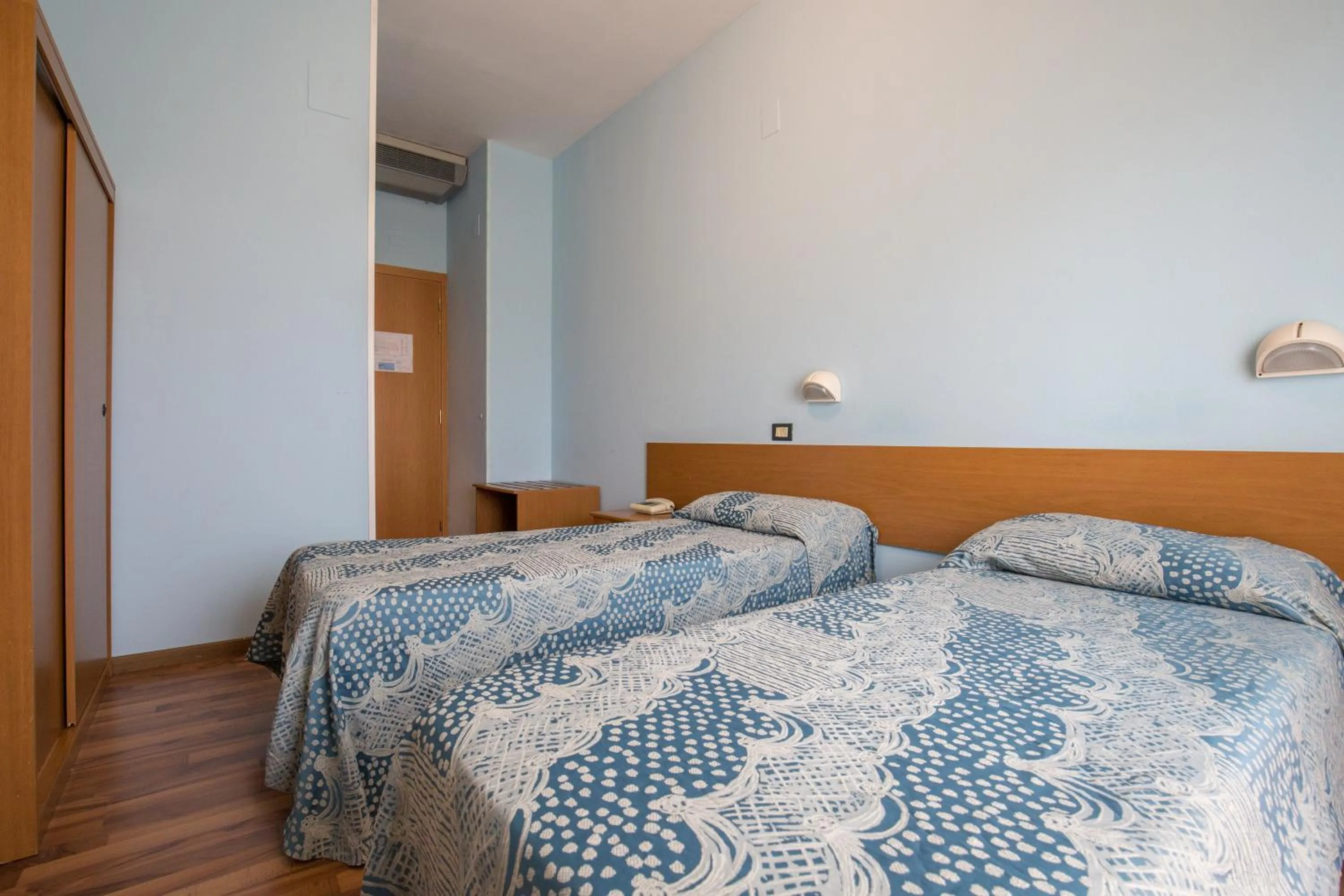 Bed in Hotel L'Aragosta