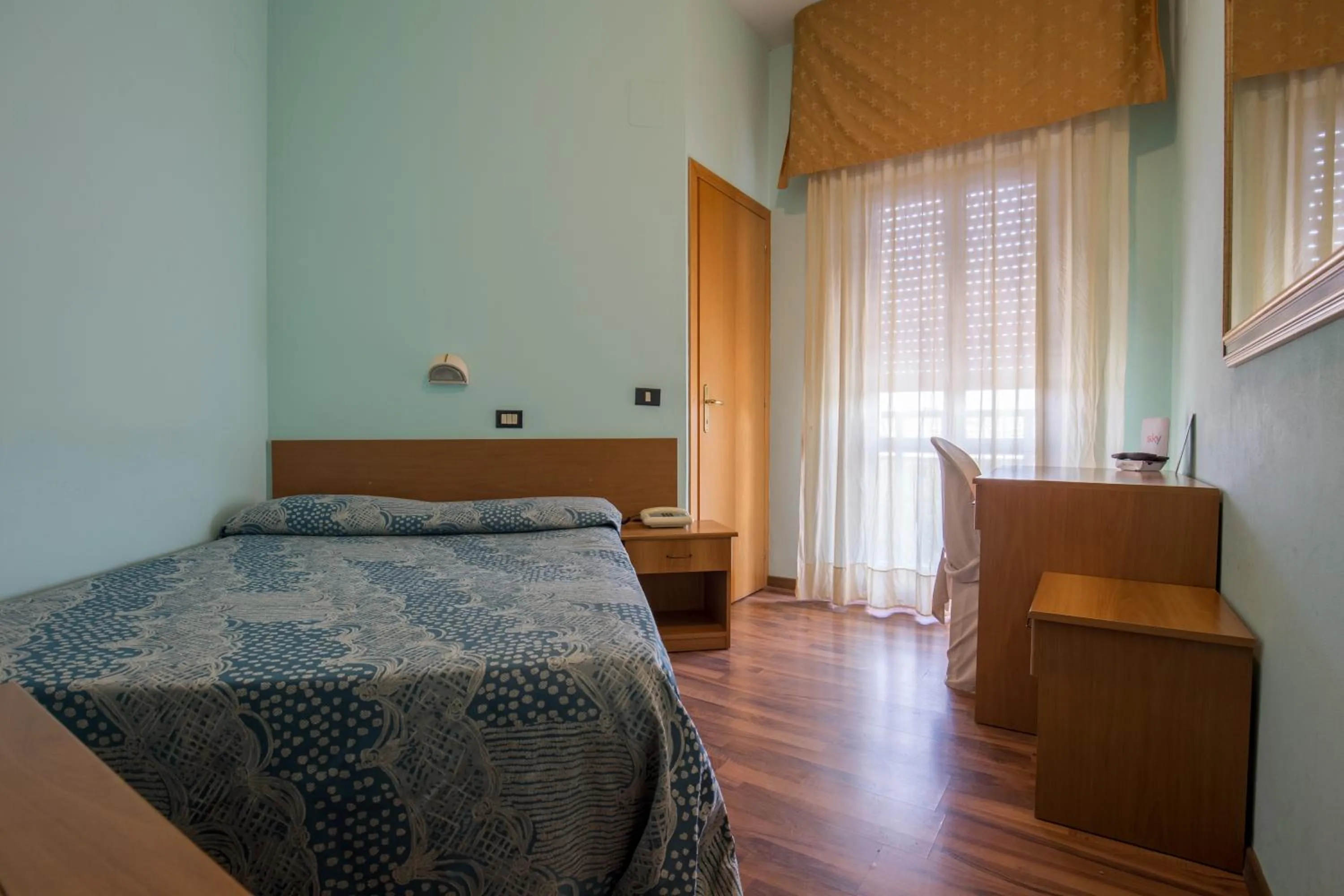 Bed in Hotel L'Aragosta