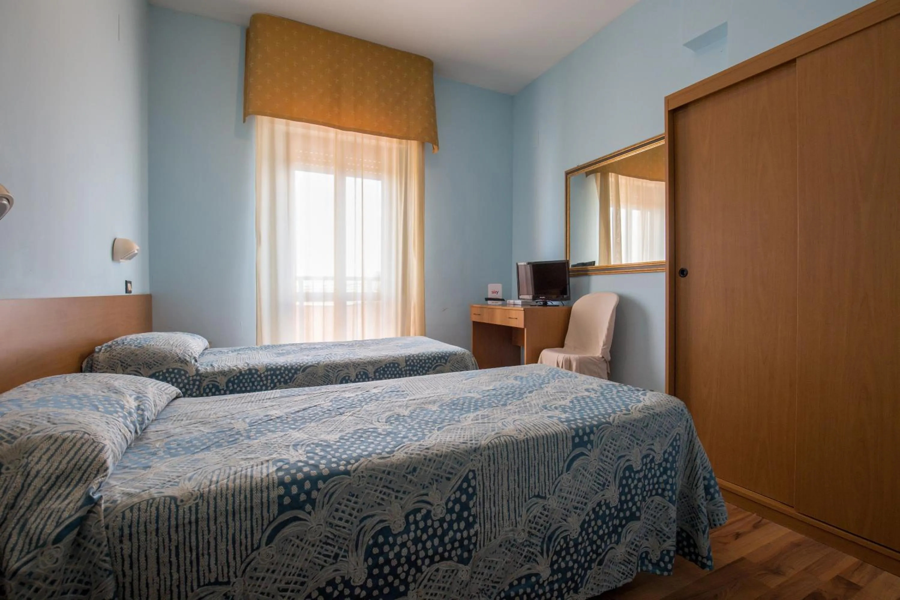 Bed in Hotel L'Aragosta