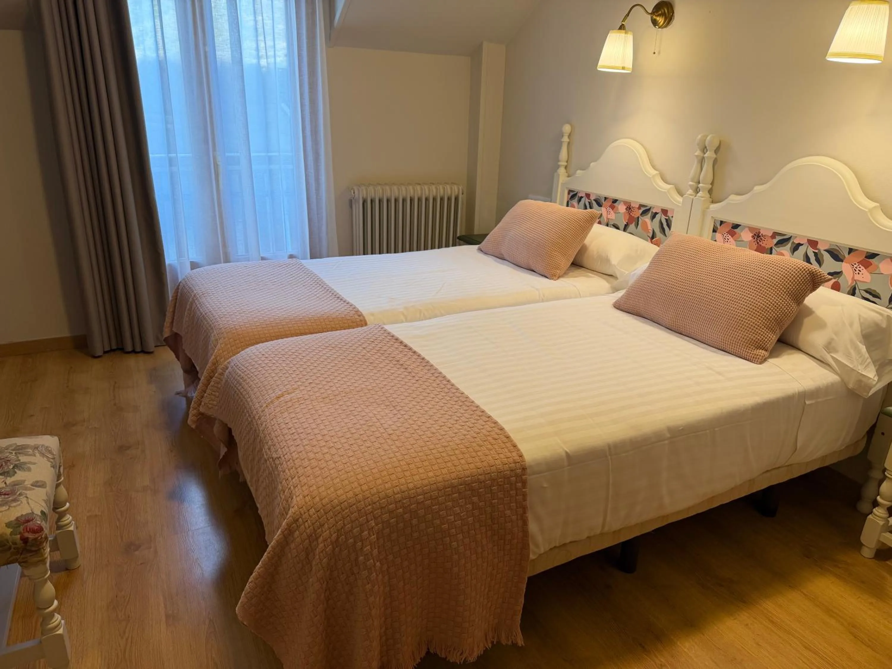 Bed in Edelweiss Hotel