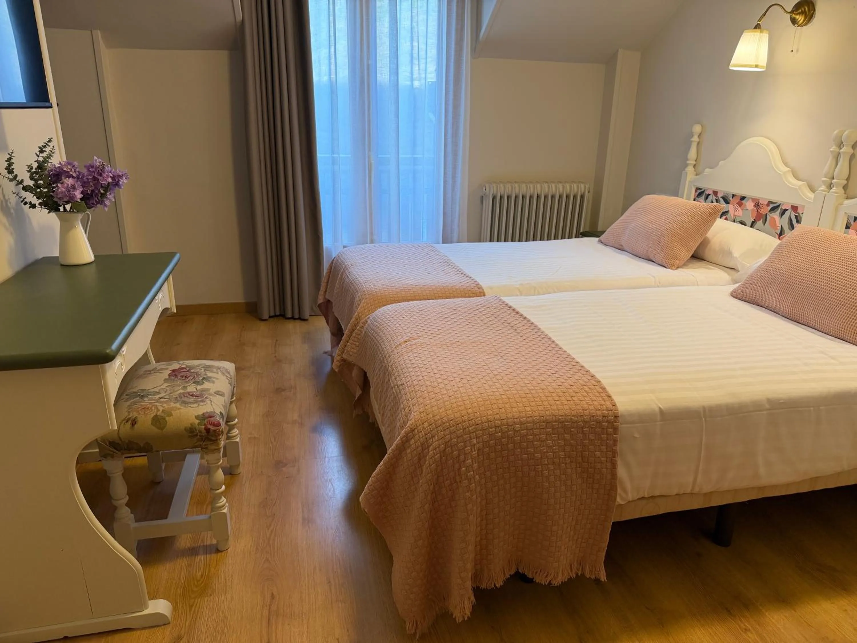 Bed in Edelweiss Hotel