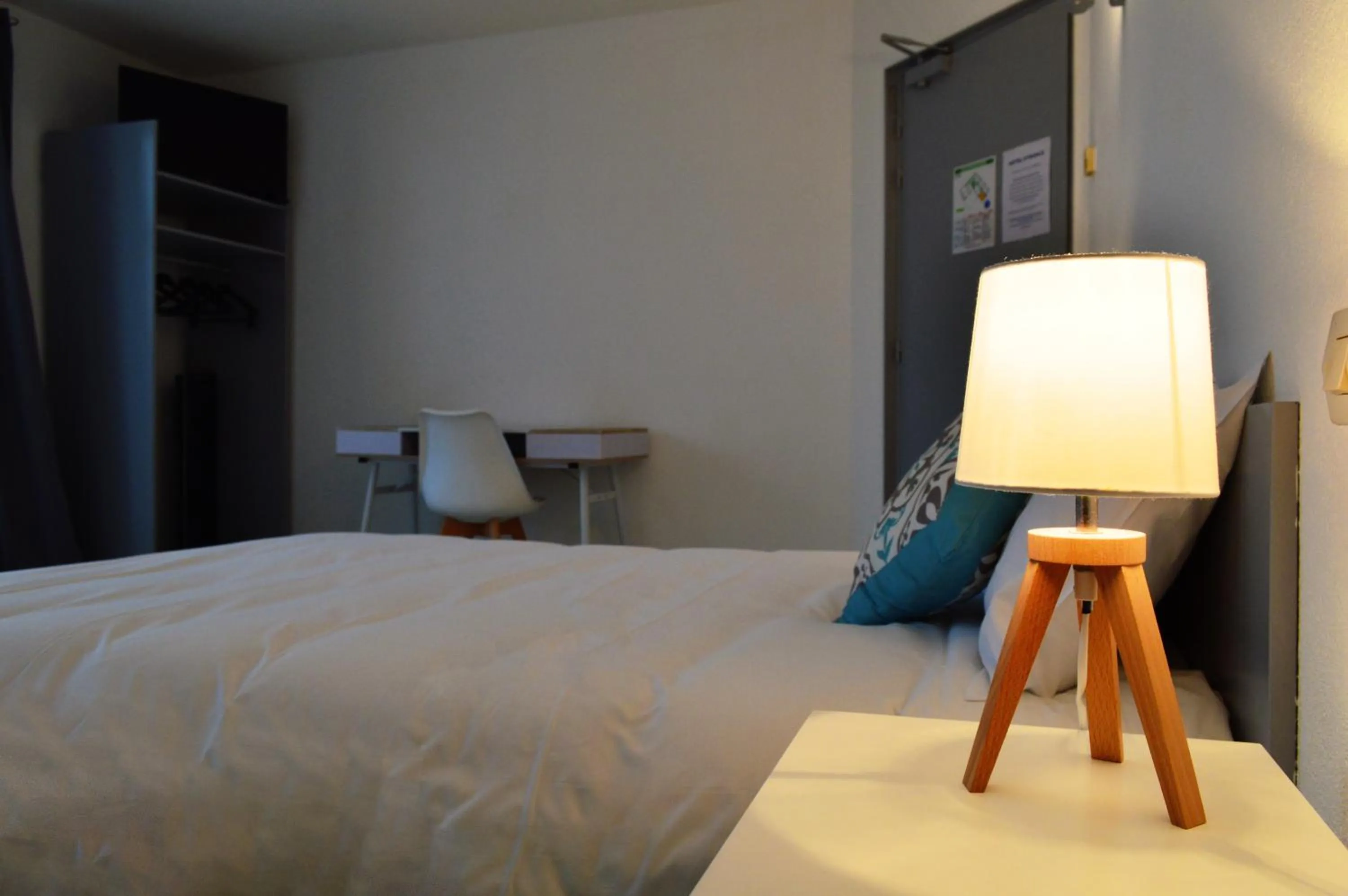 Photo of the whole room, Bed in Hôtel de France