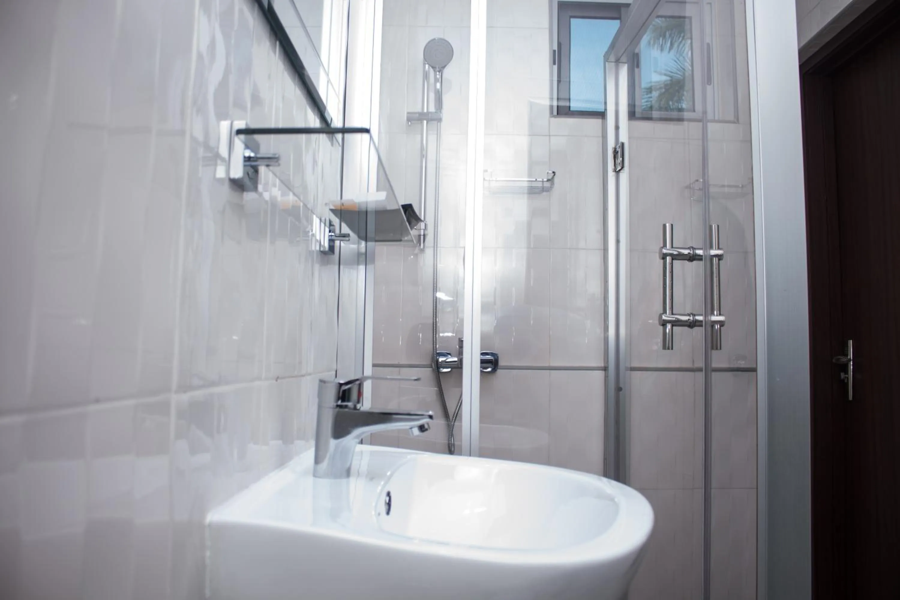 Toilet in Manjaro Suites