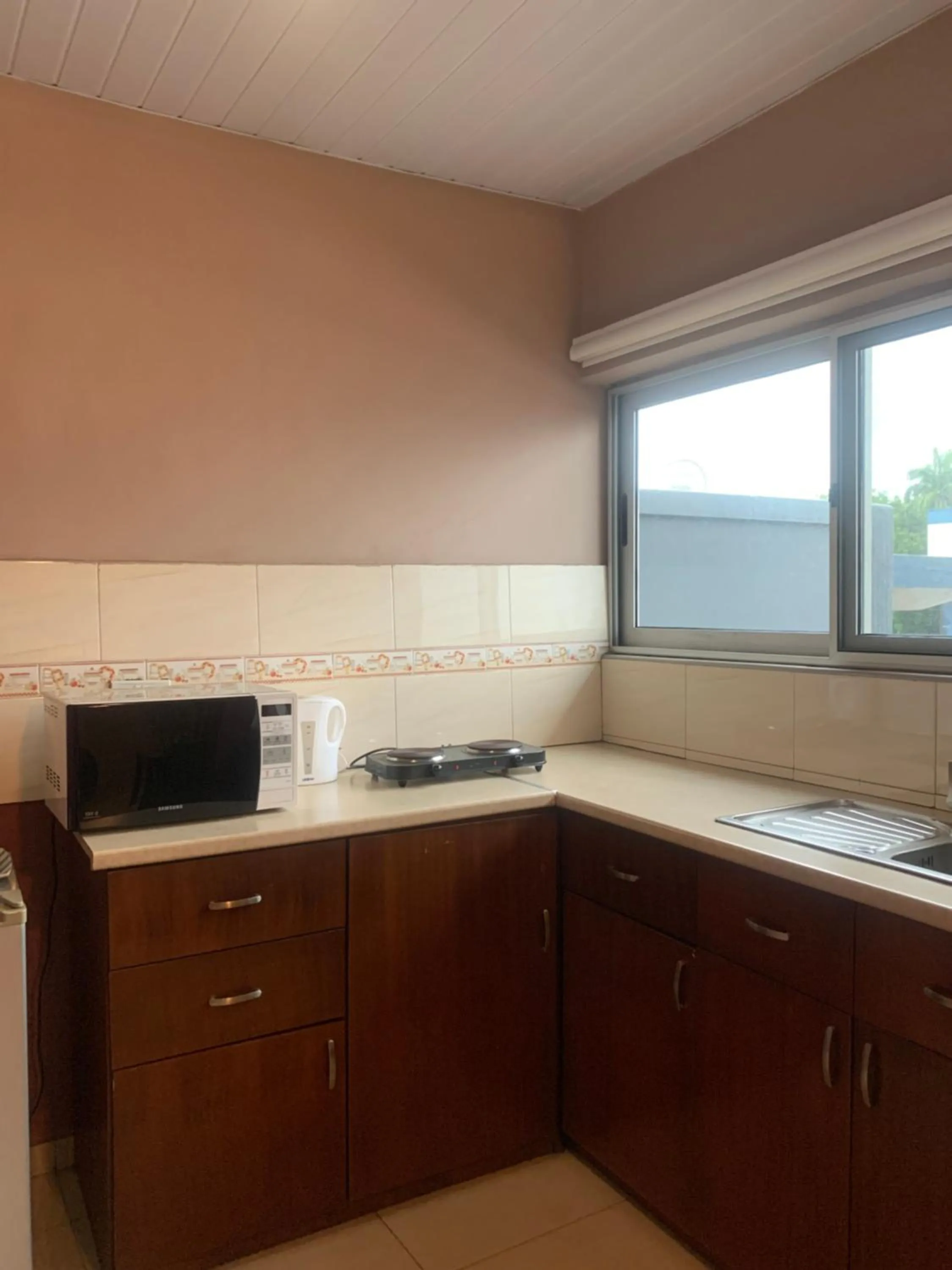 Kitchen or kitchenette in Manjaro Suites