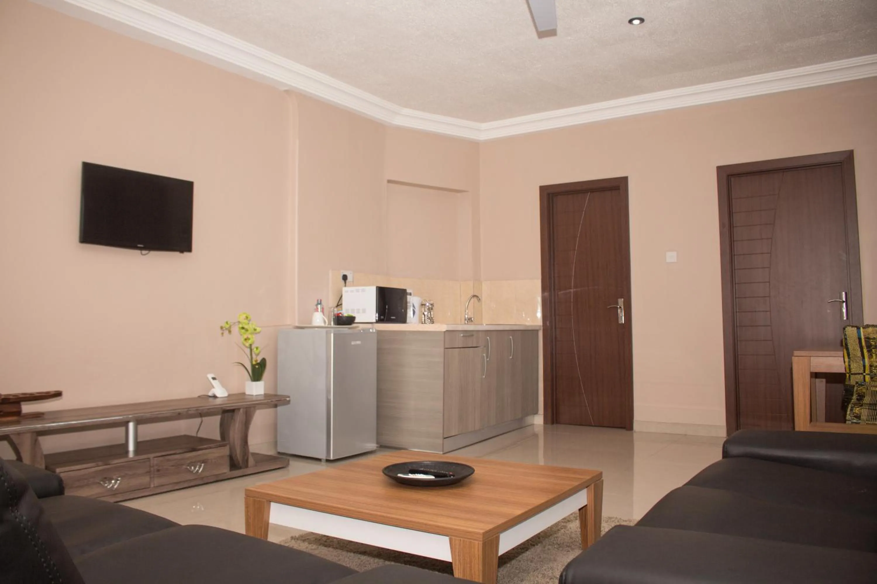 Communal lounge/ TV room in Manjaro Suites