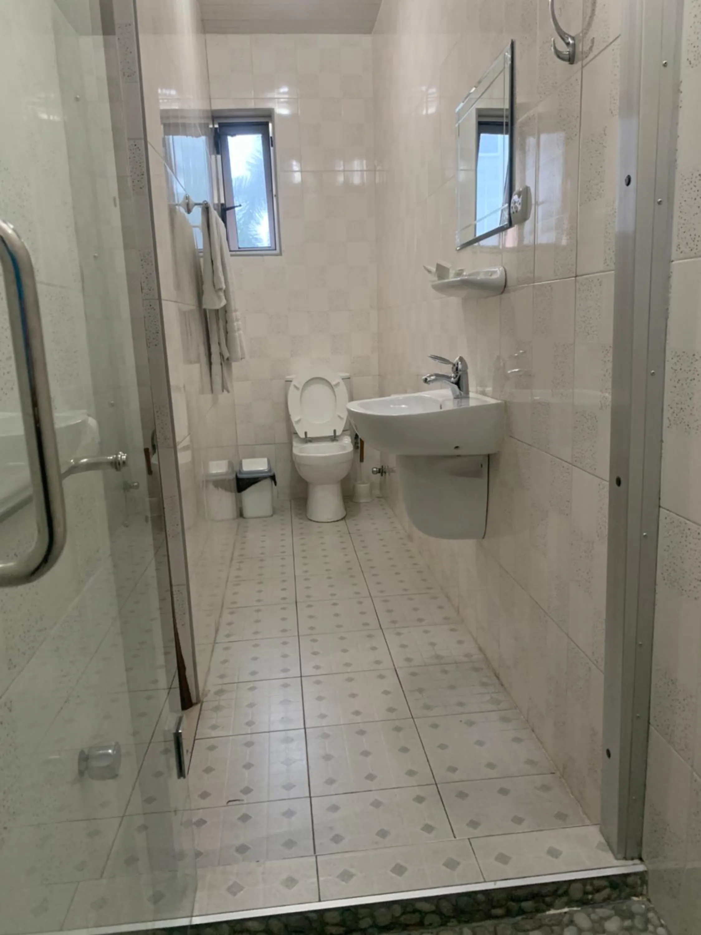 Toilet in Manjaro Suites