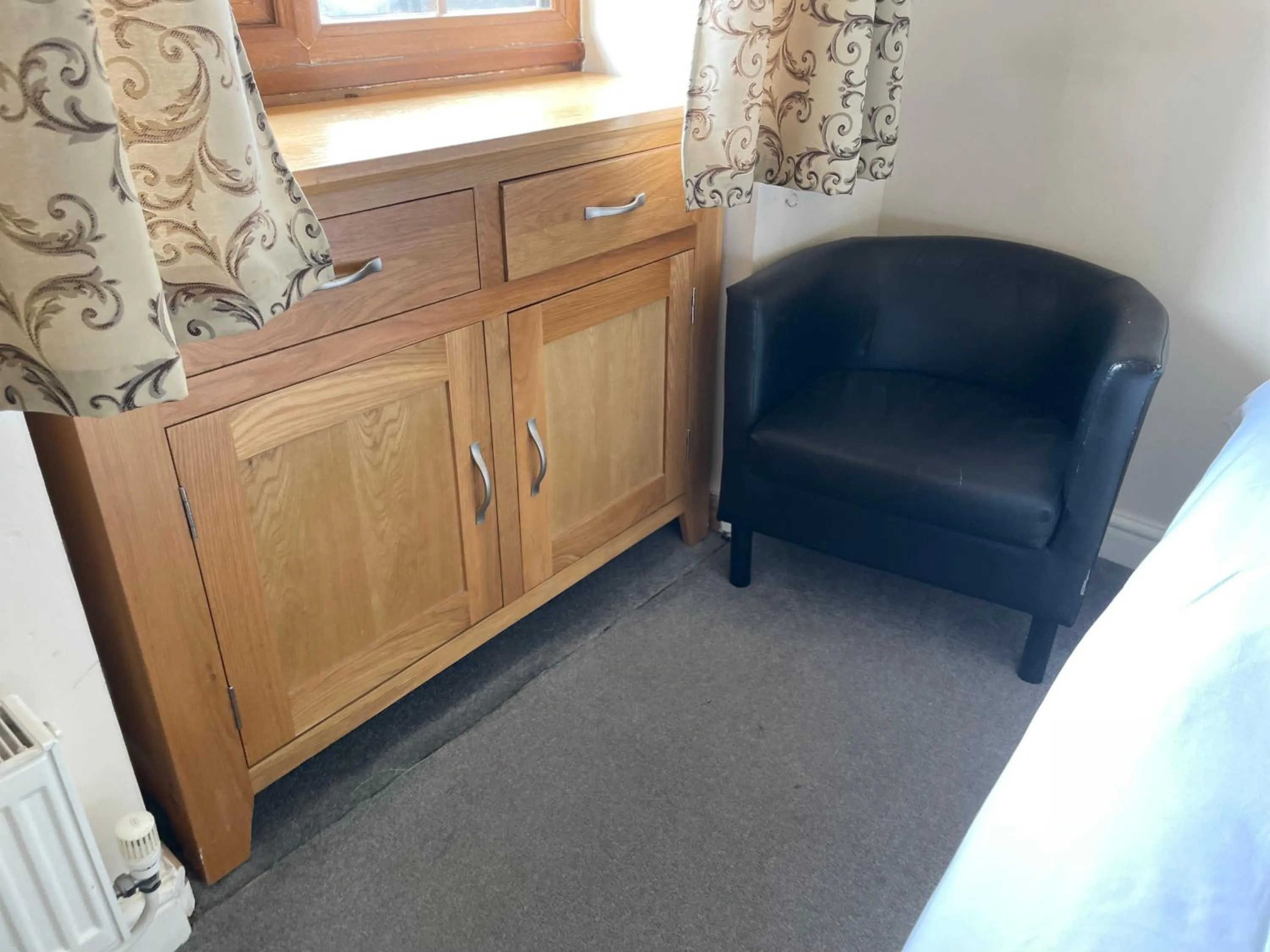 Seating area in Bridge Farm Guesthouse rooms