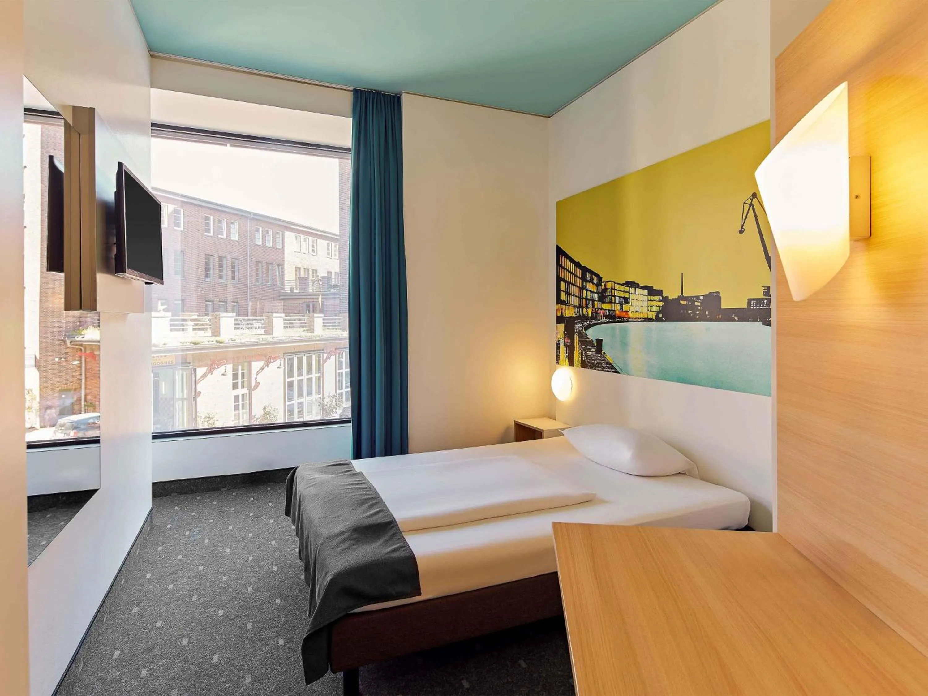 Photo of the whole room, Bed in B&B HOTEL Münster Hafen