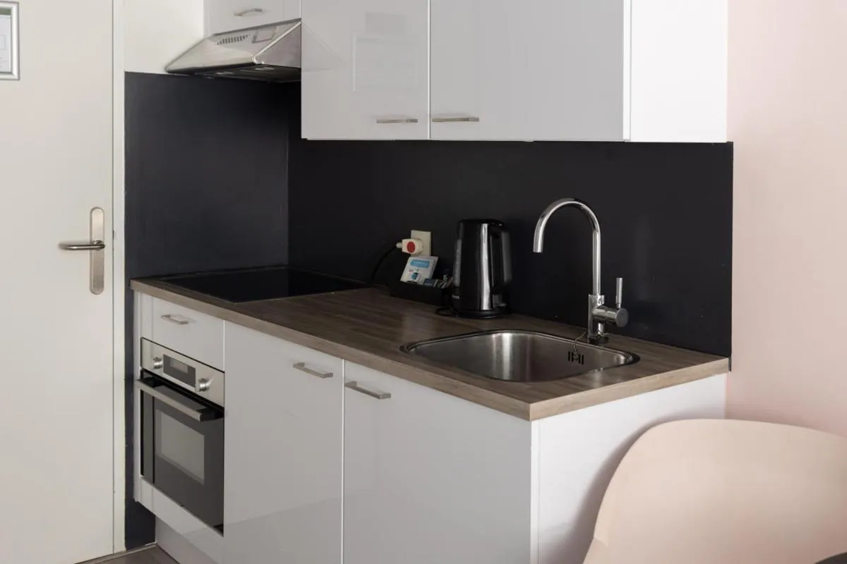 kitchen in Hotel2Stay