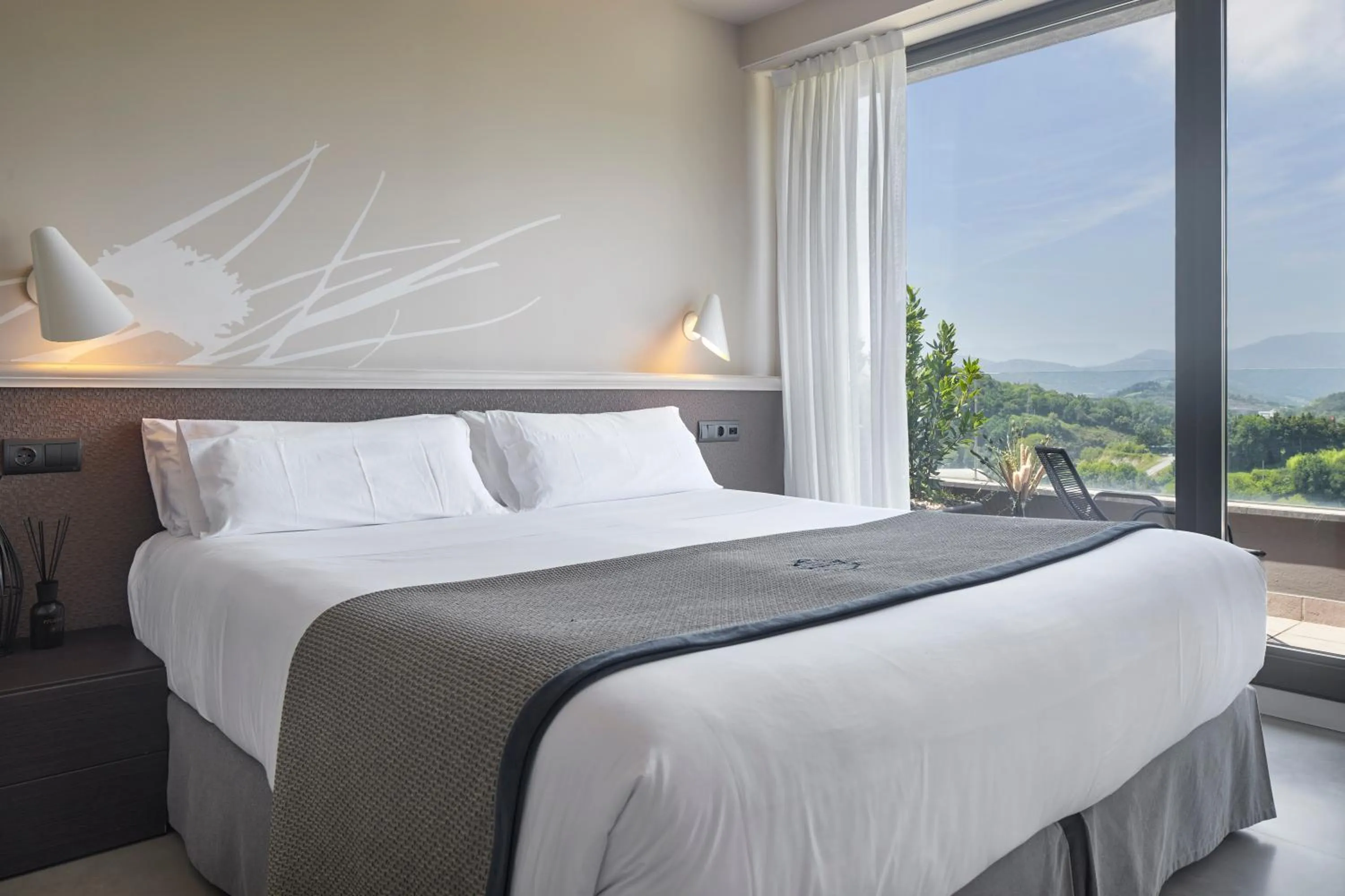 Bed in FeelFree STAYS Basoa