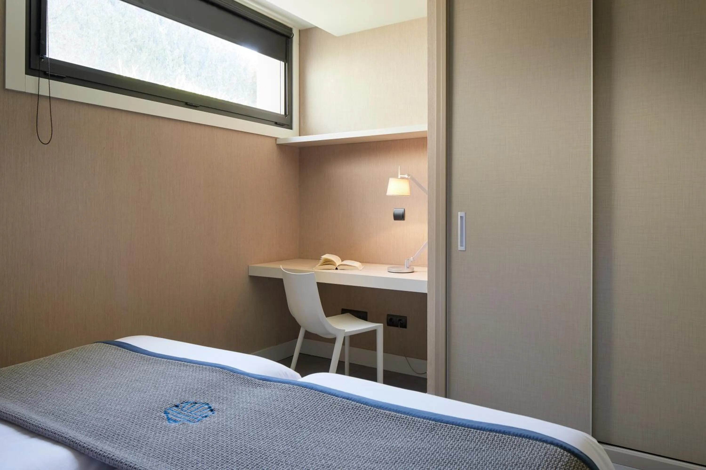 Bed in FeelFree STAYS Basoa