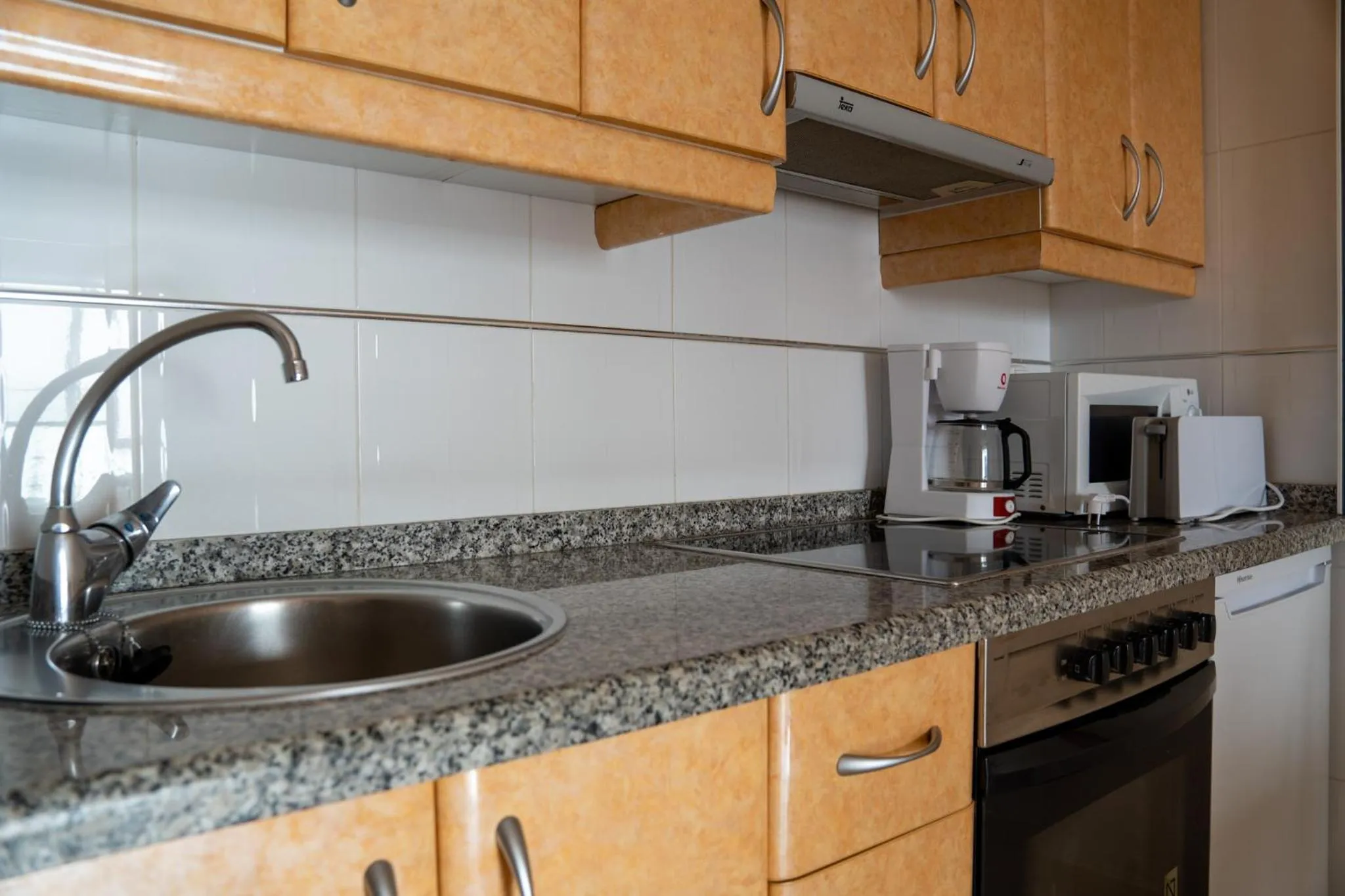 Kitchen or kitchenette in Apartamentos Ambar Beach Unitursa