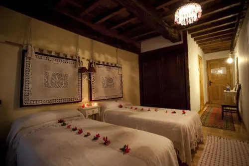 Photo of the whole room, Bed in O Muiño de Pena