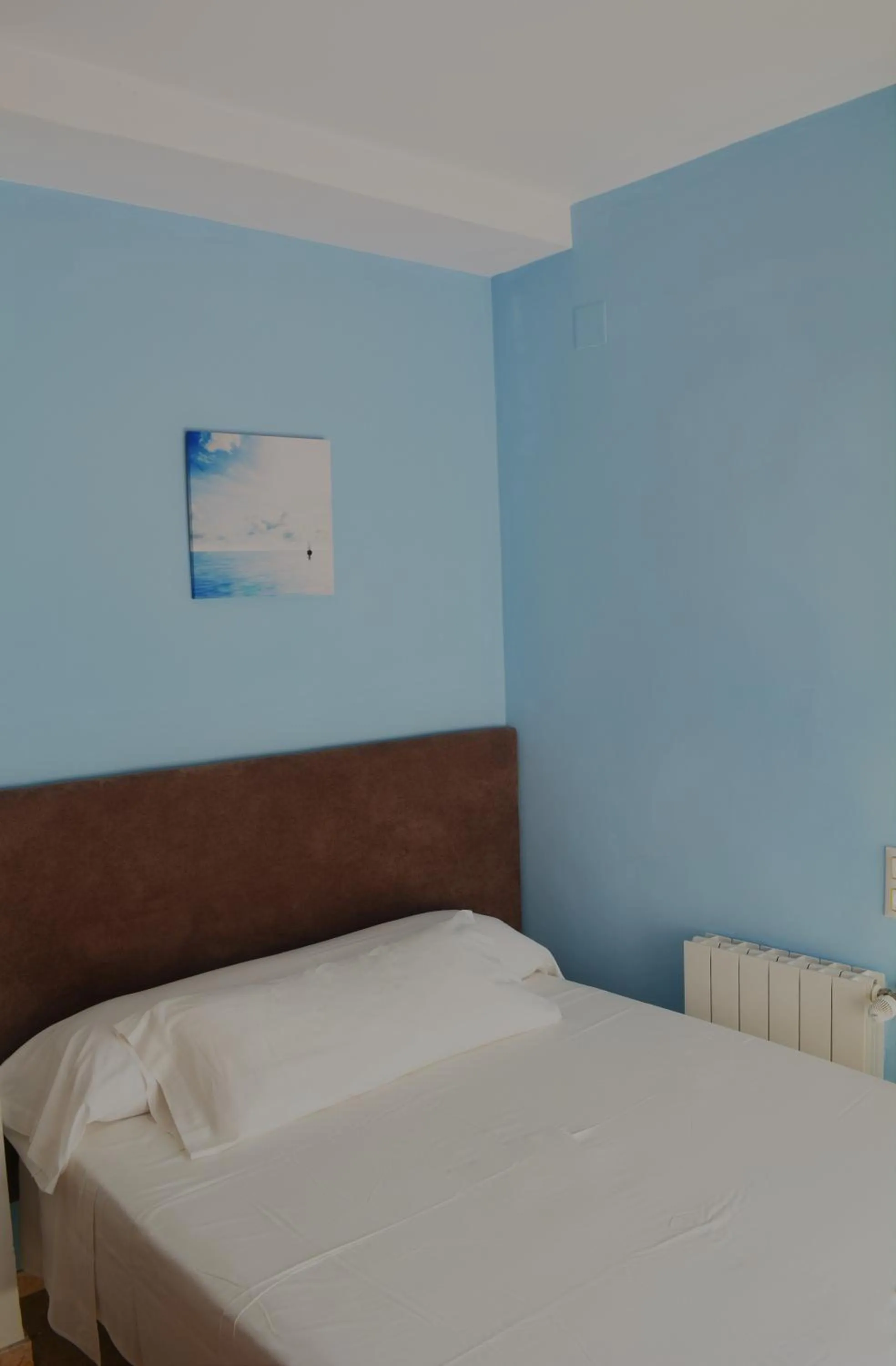 Bed in Hotel L'Escala