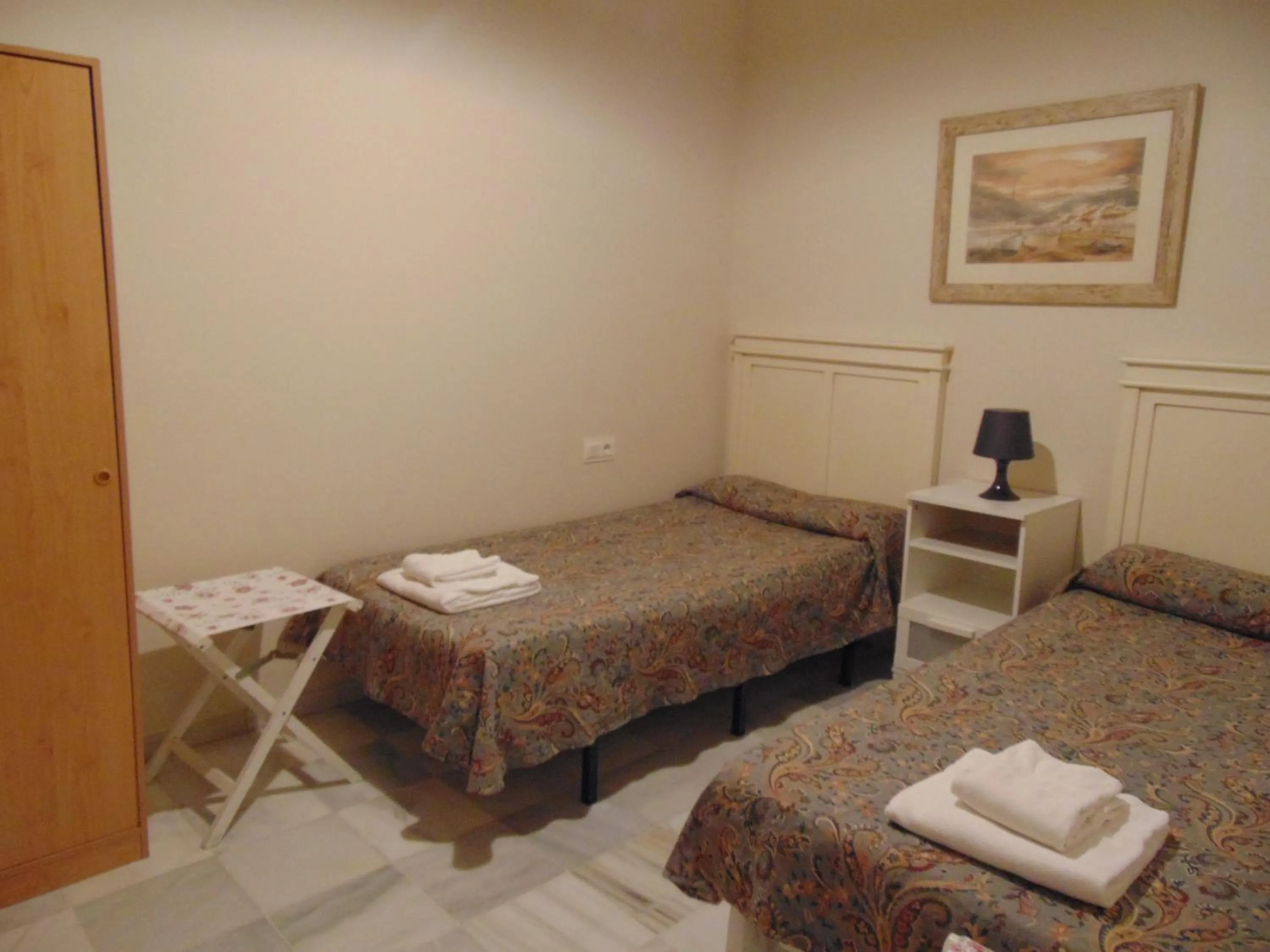 Bedroom, Bed in Apartamentos Larga 70