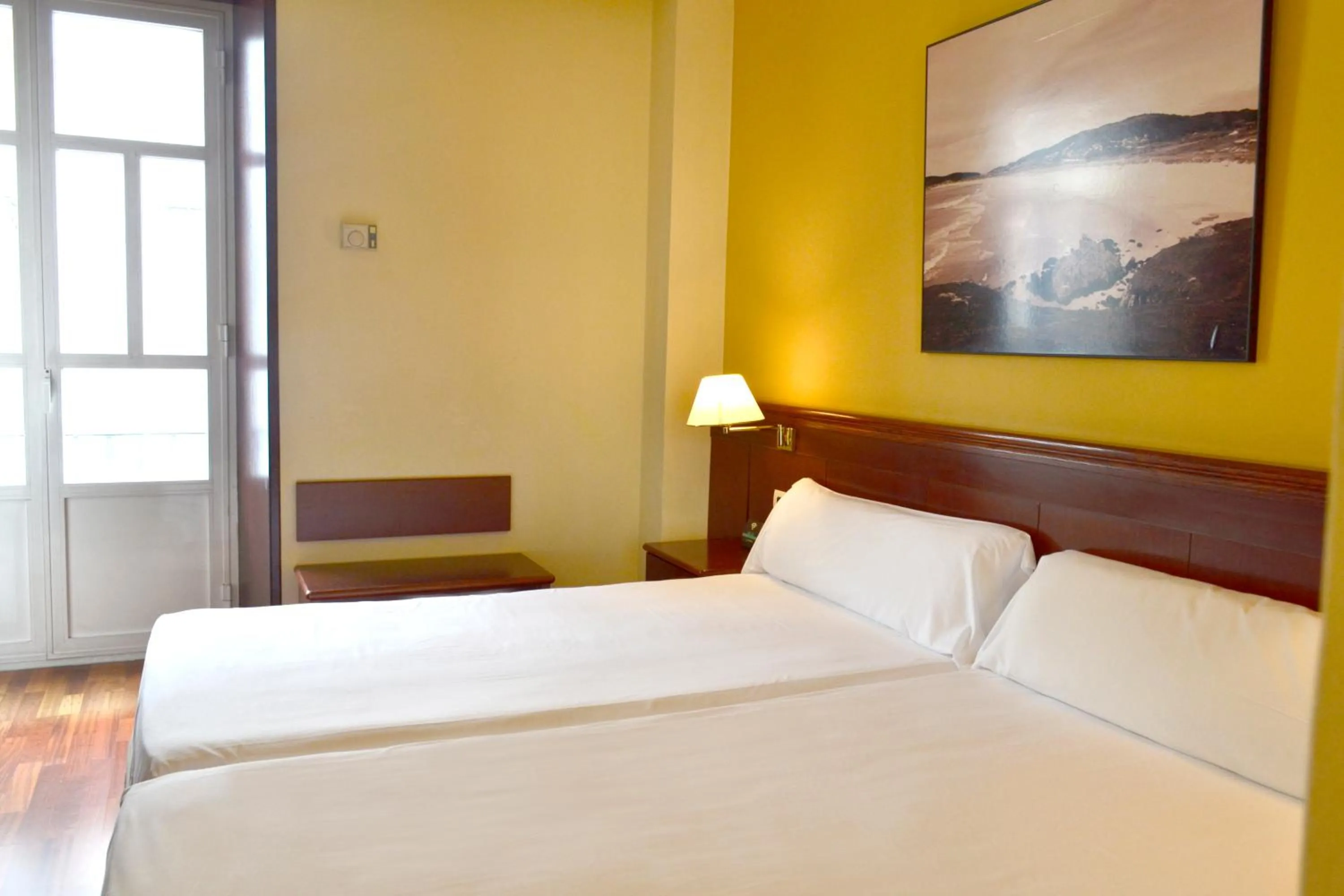 Bed in Hotel Alda El Suizo