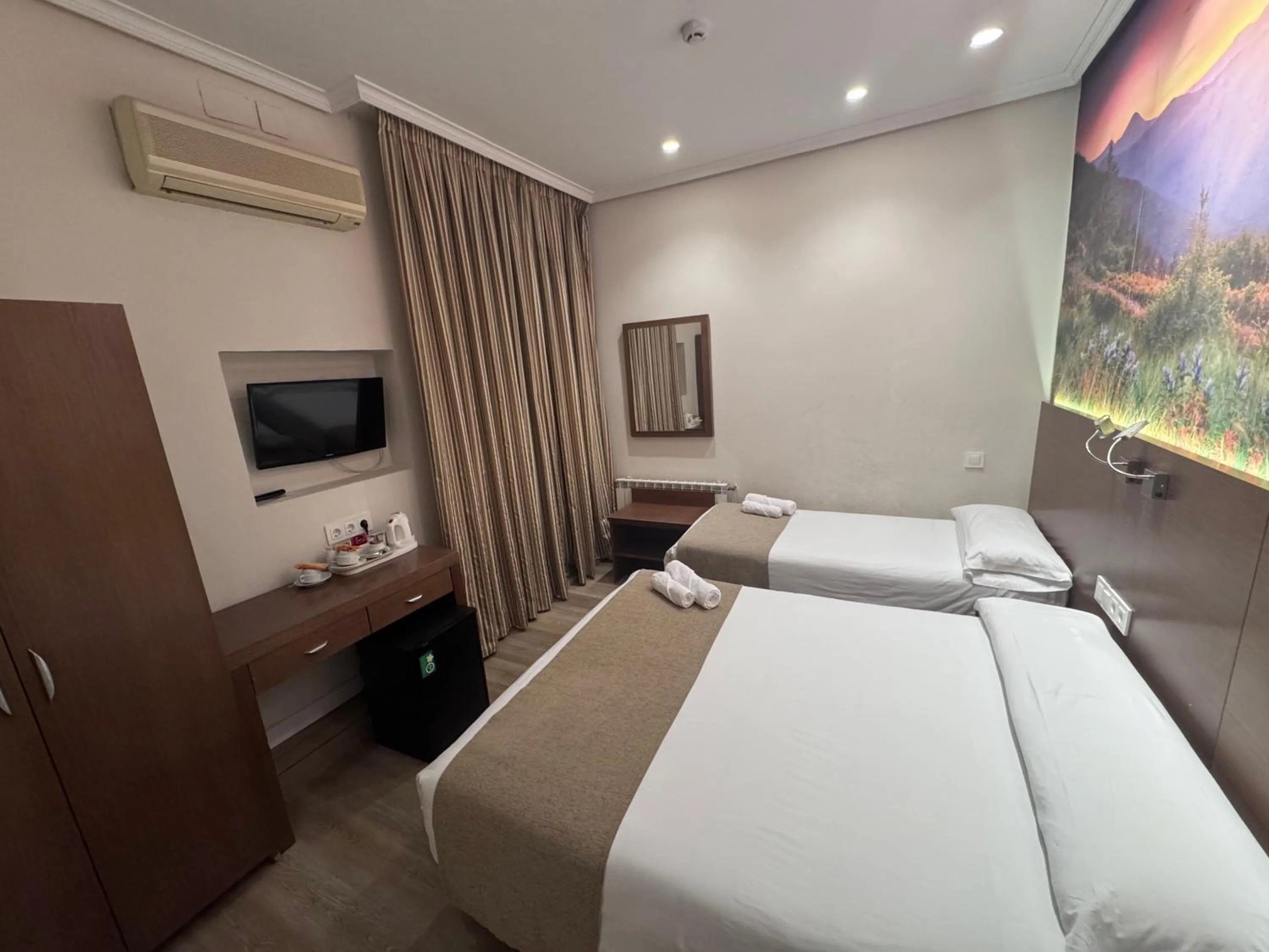 Bed in Hostal Atocha Almudena Martín