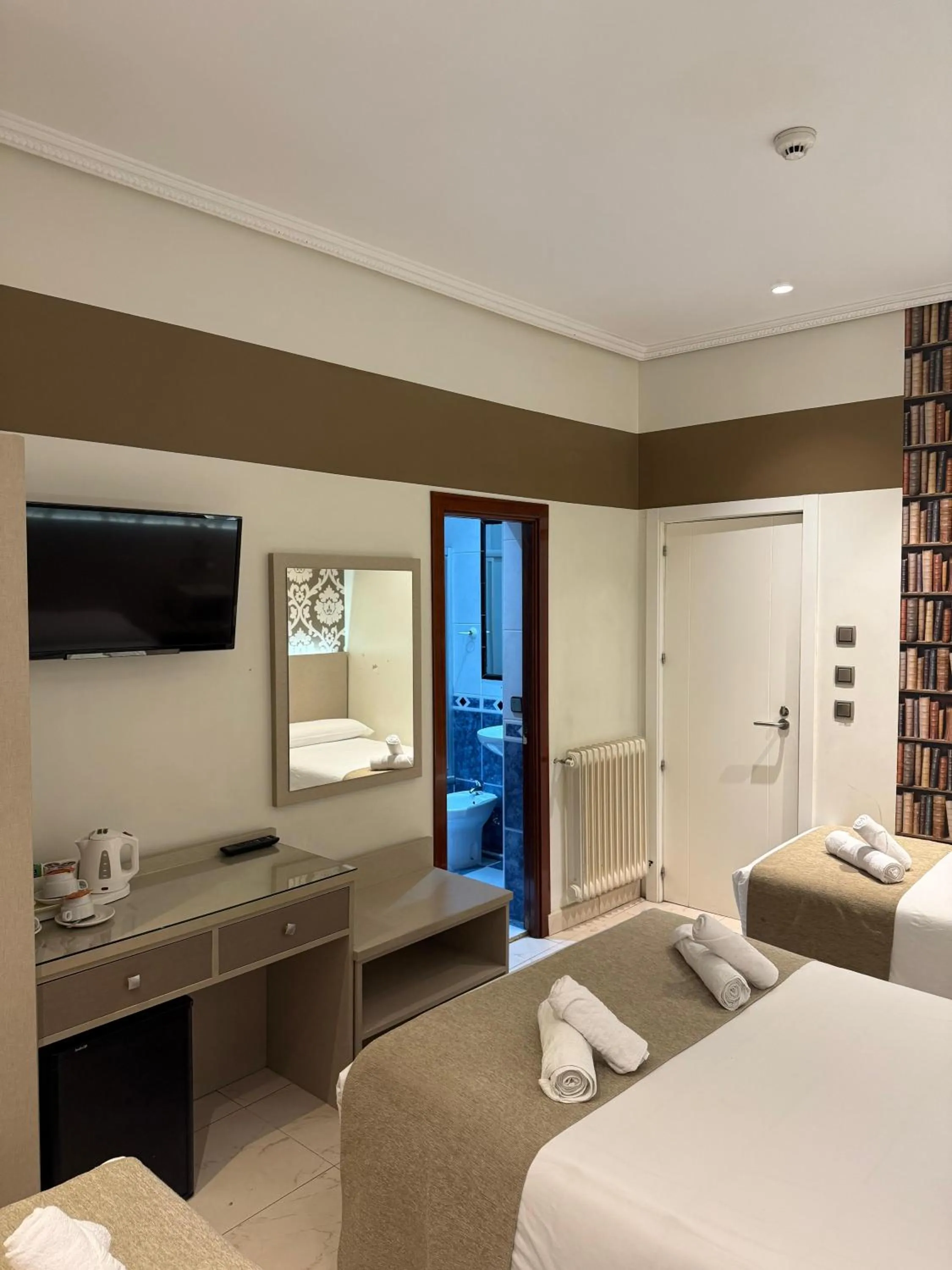 Bed in Hostal Atocha Almudena Martín