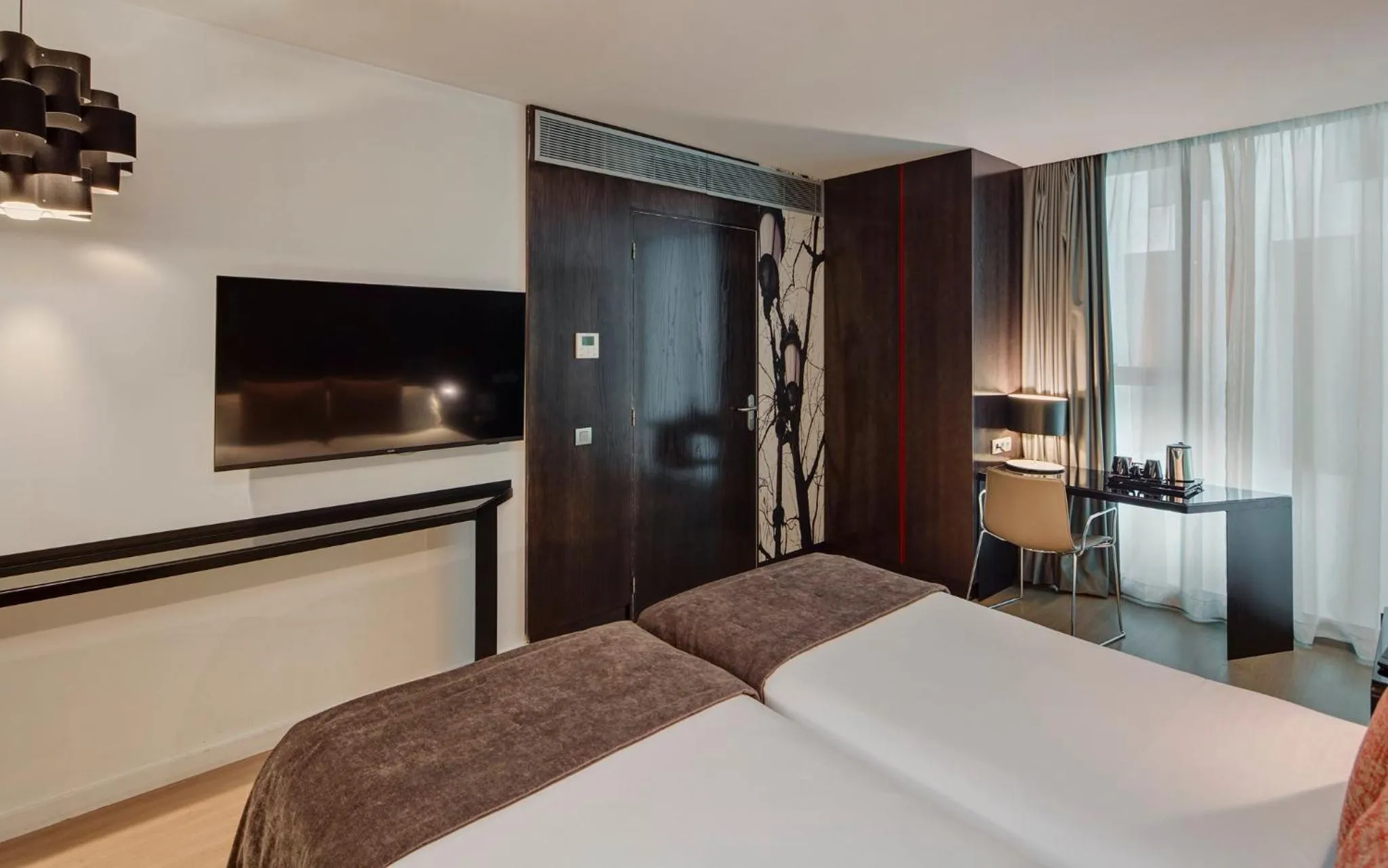 Photo of the whole room, Bed in Sercotel Hotel Rosellon