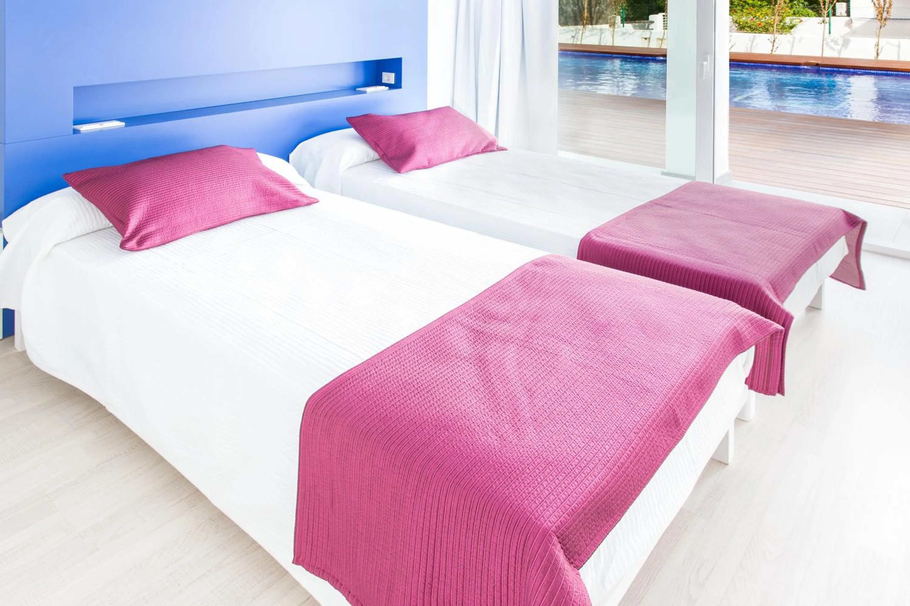 Bed in Ebano Hotel Apartments & Spa