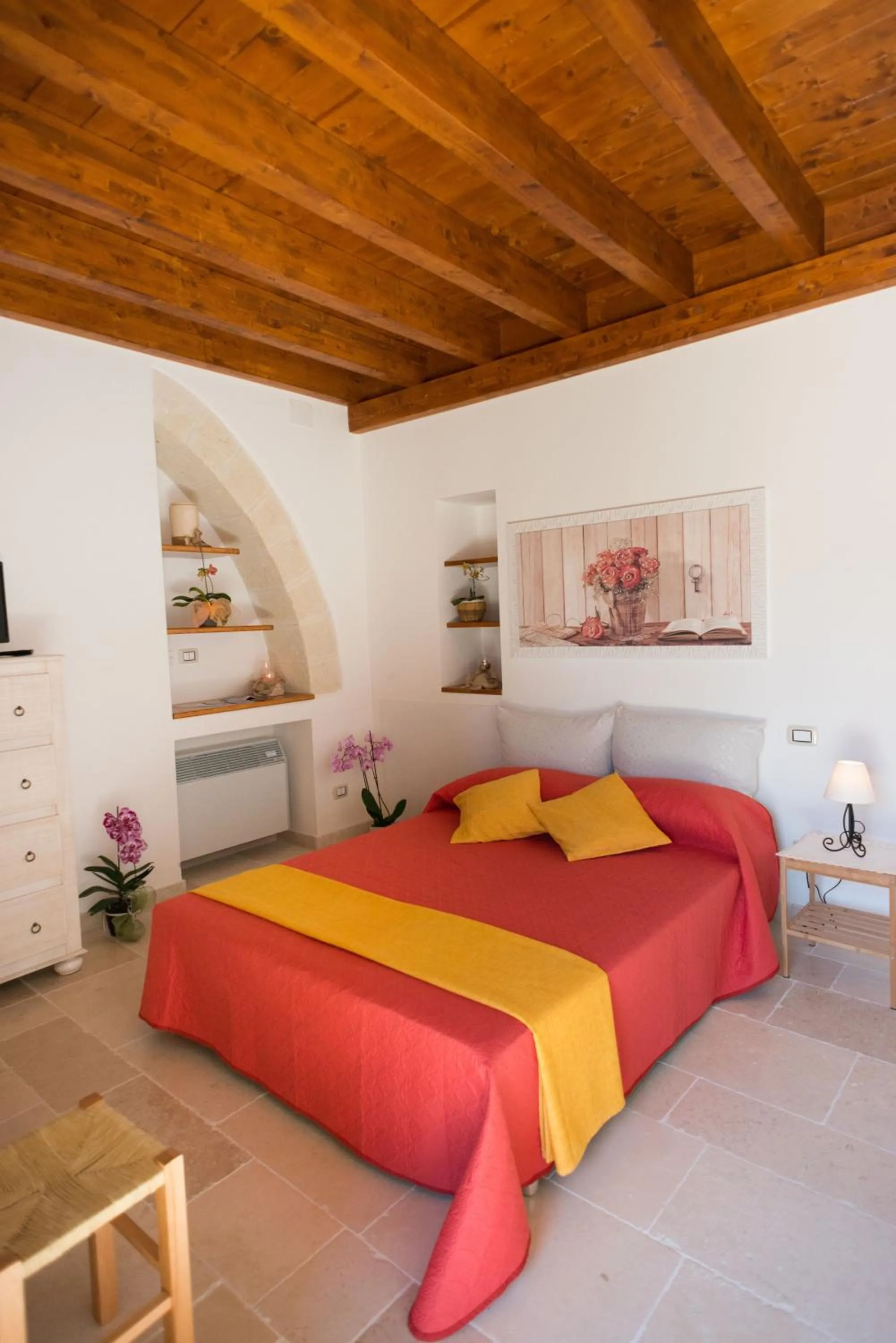 Bed in Grandi Trulli Bed & Breakfast