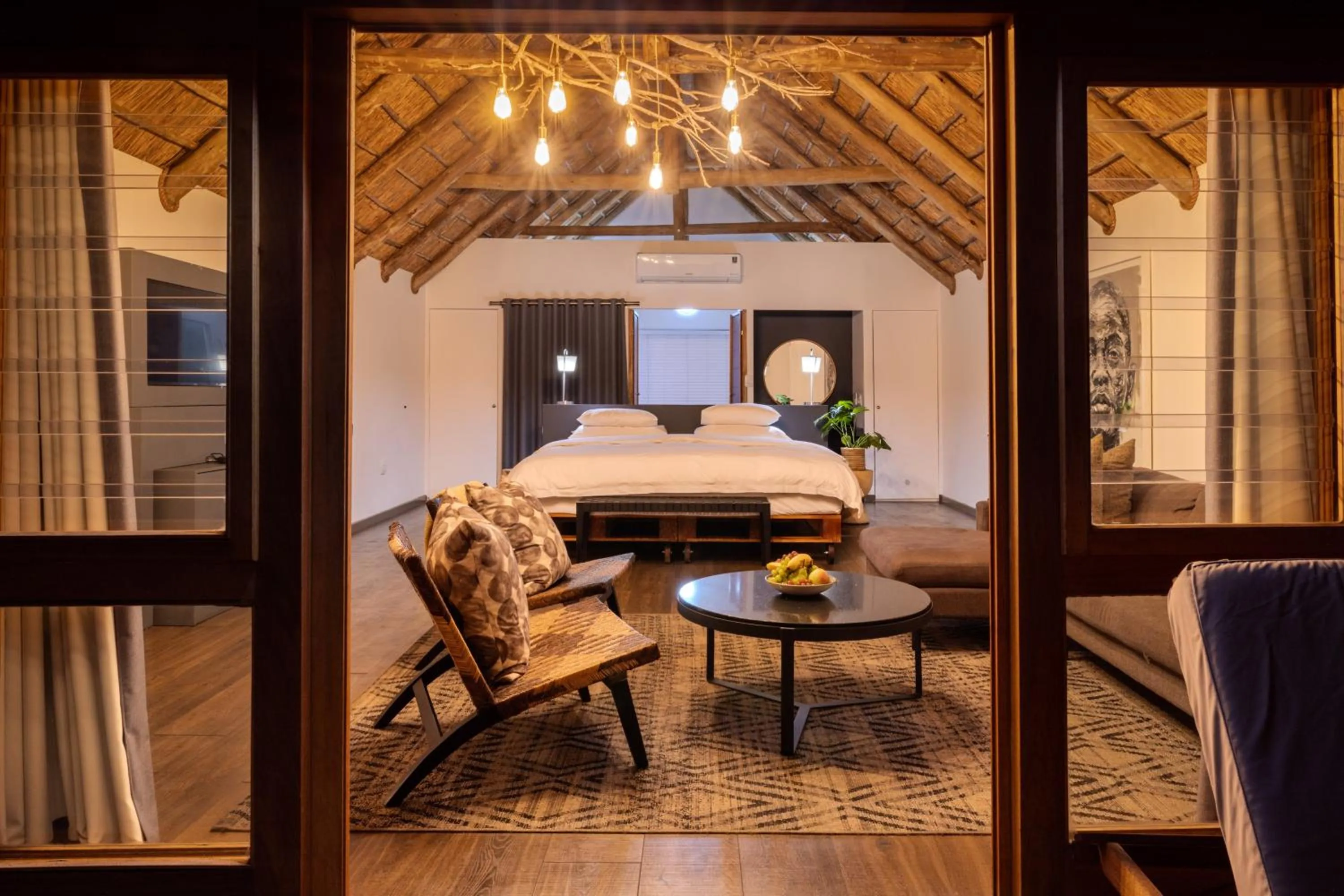 Seating area, Bed in Cradle Boutique Hotel