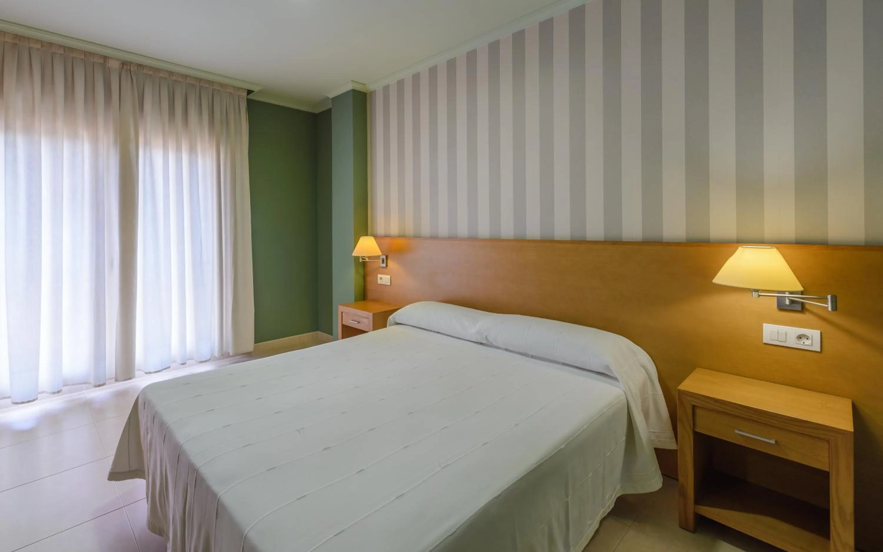 Bedroom, Bed in Apartamentos Trisquel