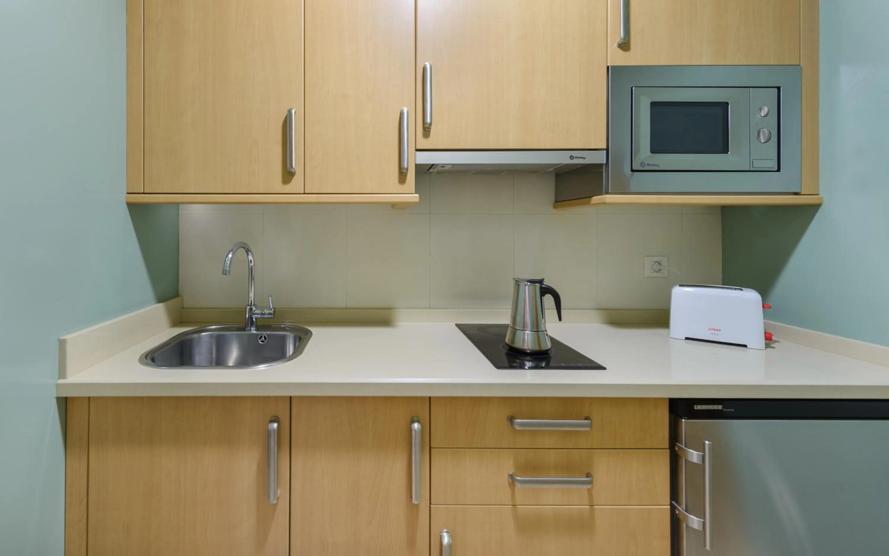 Kitchen or kitchenette in Apartamentos Trisquel