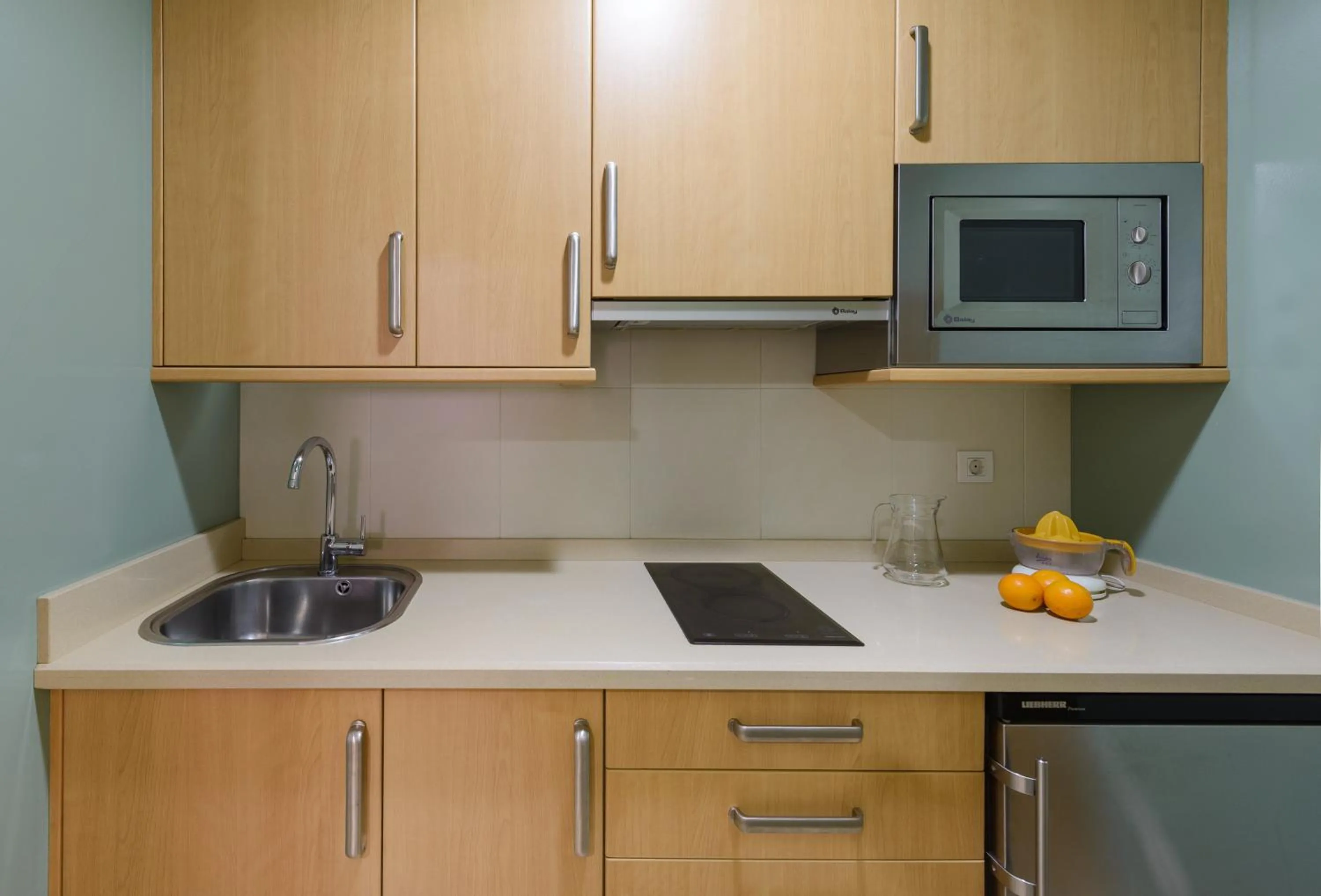 Kitchen or kitchenette in Apartamentos Trisquel