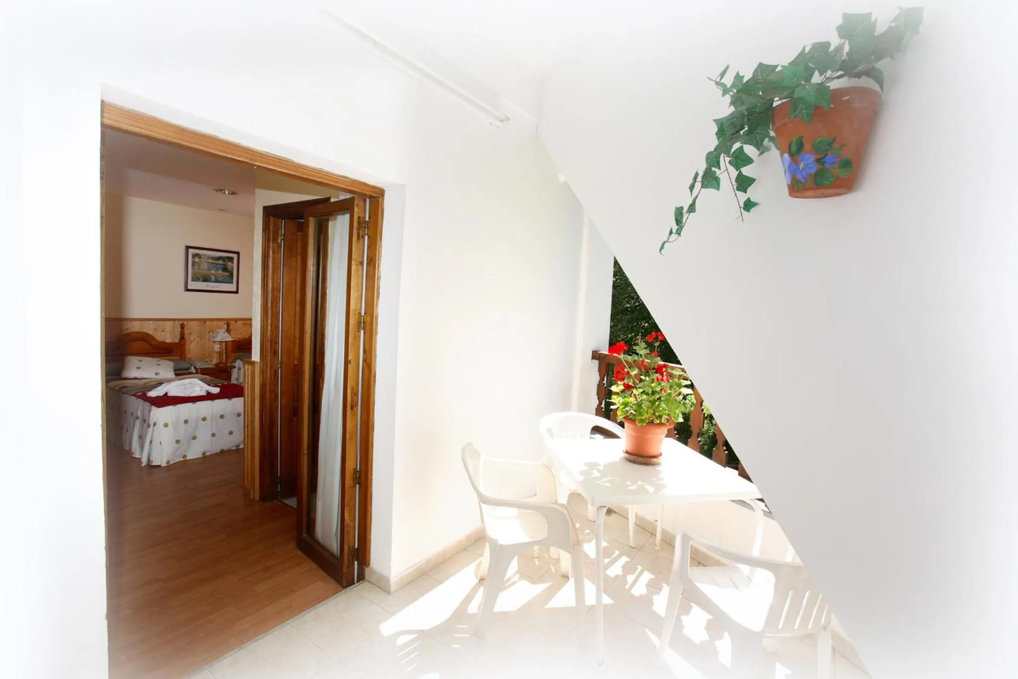 Balcony/Terrace, Bed in Hotel Rural El Molino