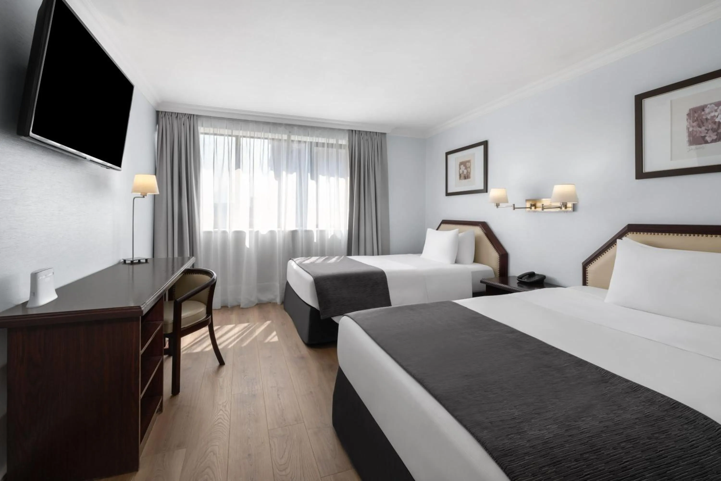 Bed in Wyndham Garden Santiago Kennedy