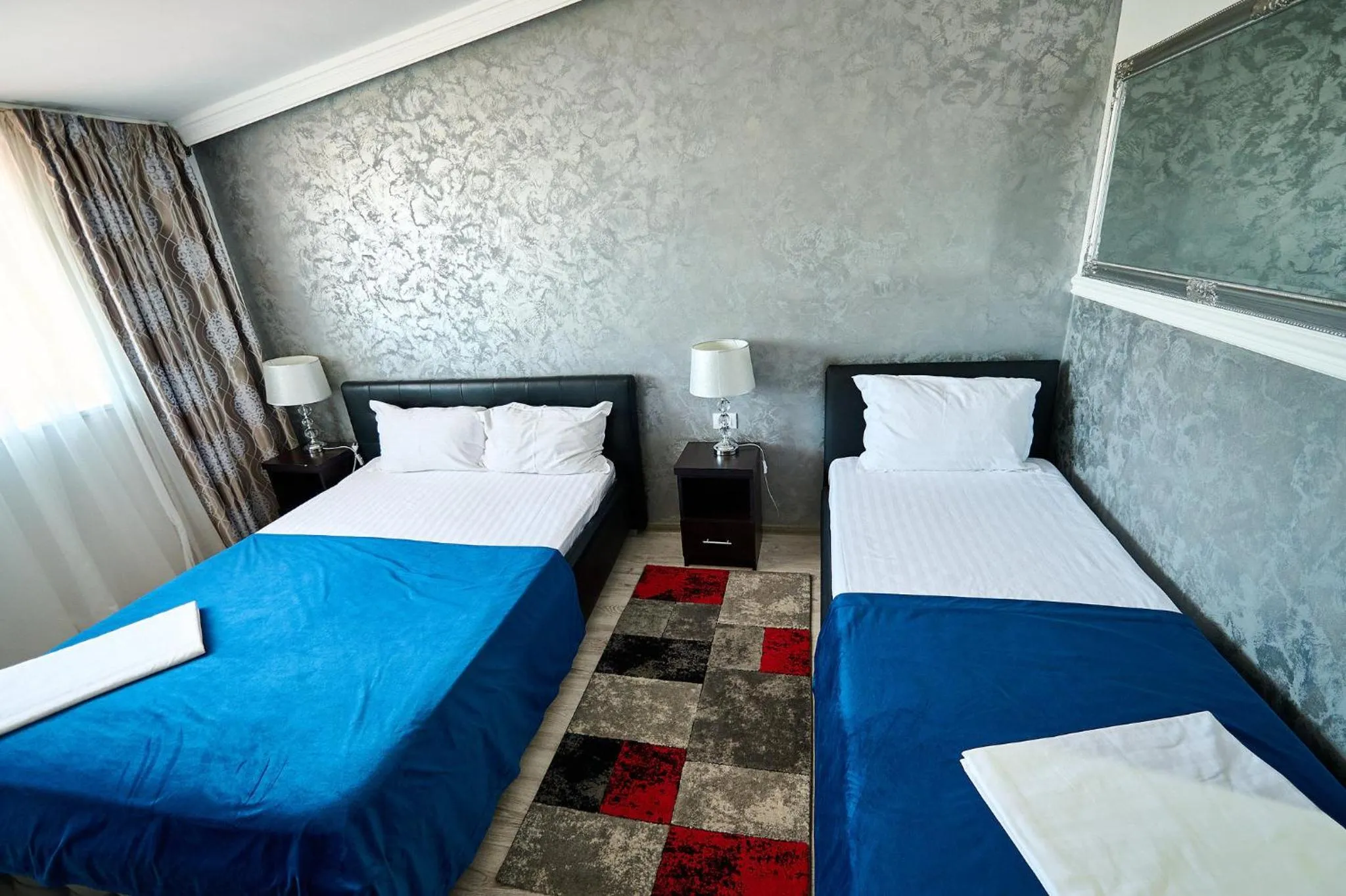 Bed in Hotel Evianne Boutique