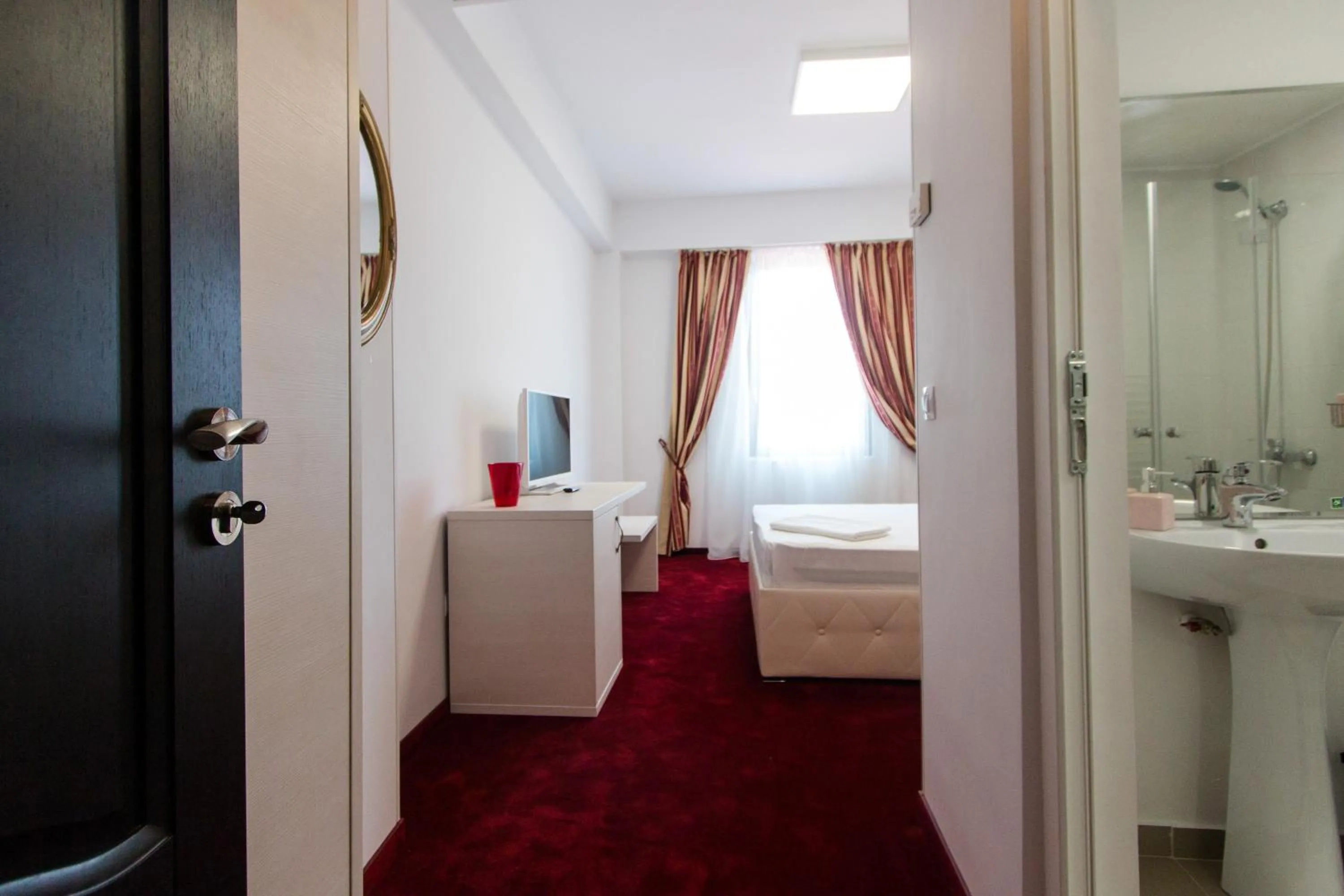 Photo of the whole room, Bed in Hotel Evianne Boutique