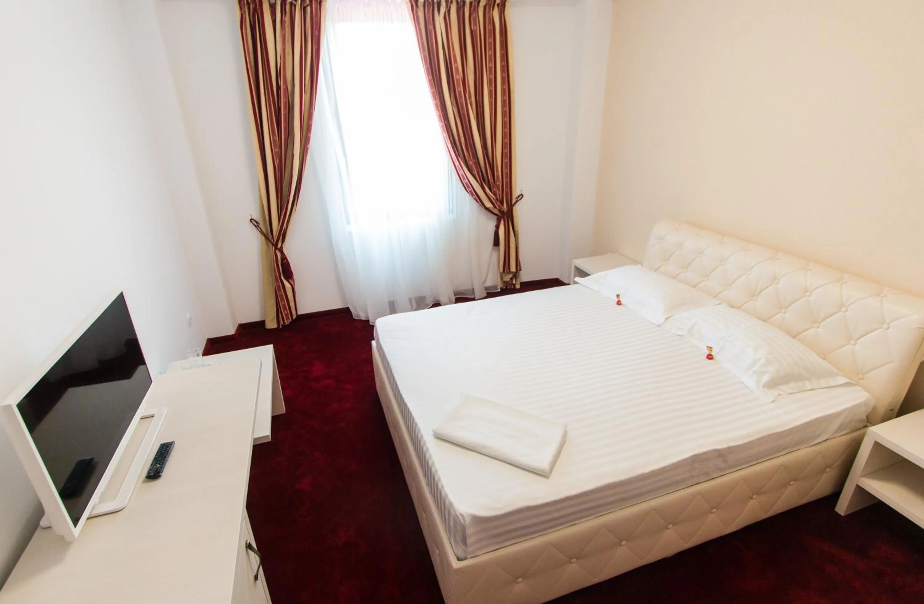 Photo of the whole room, Bed in Hotel Evianne Boutique