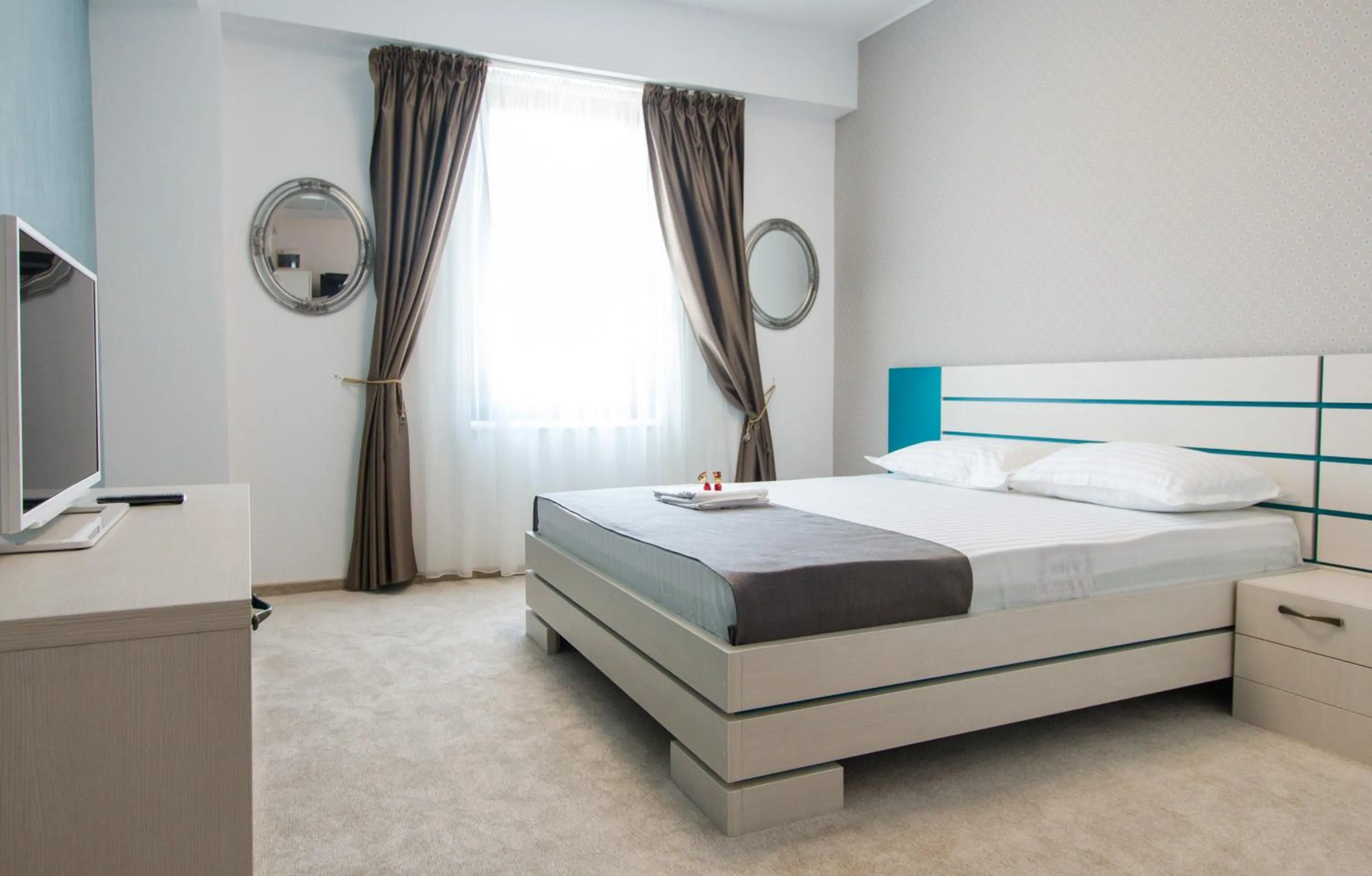 Bed in Hotel Evianne Boutique