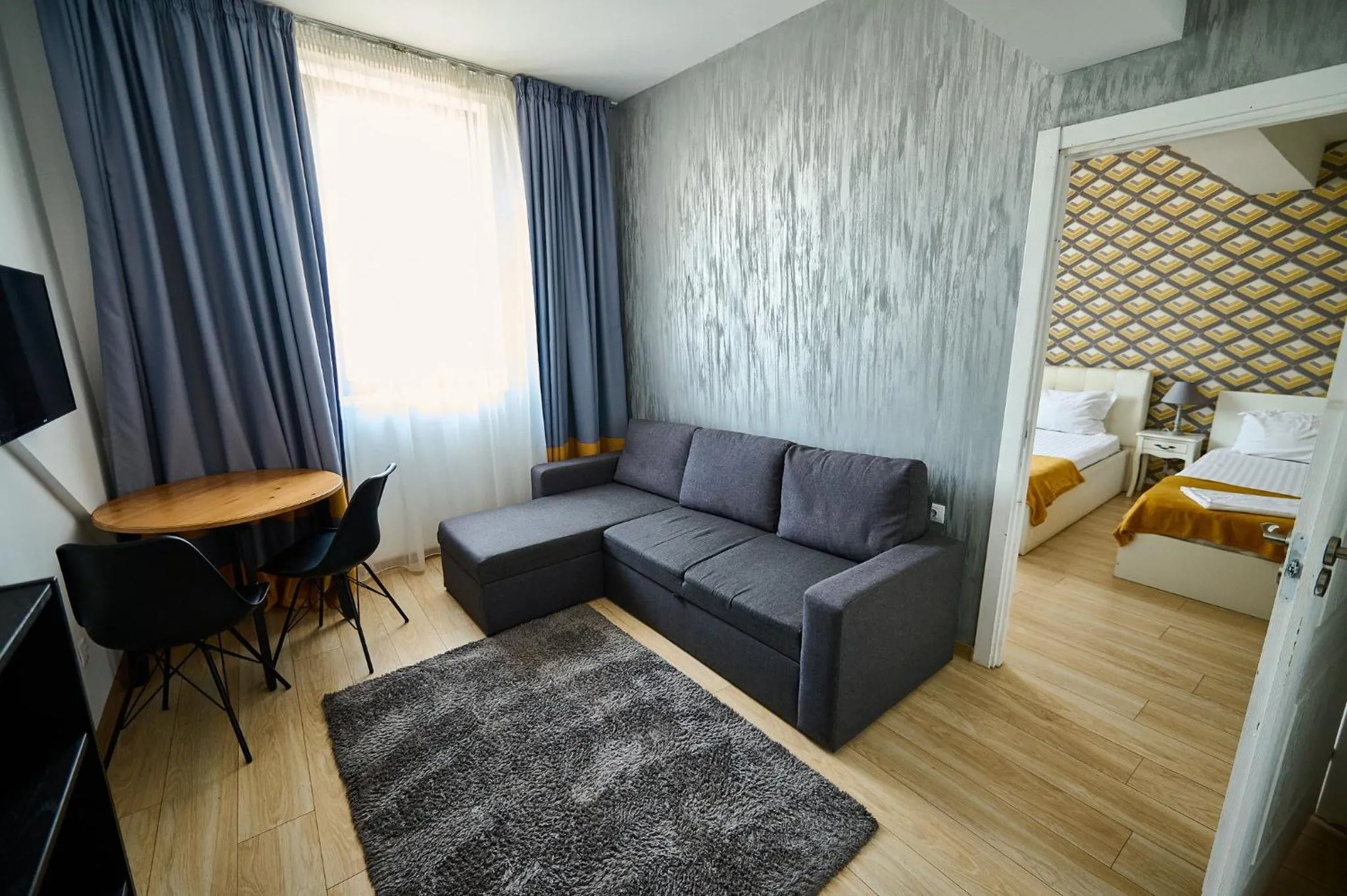 Living room, Bed in Hotel Evianne Boutique