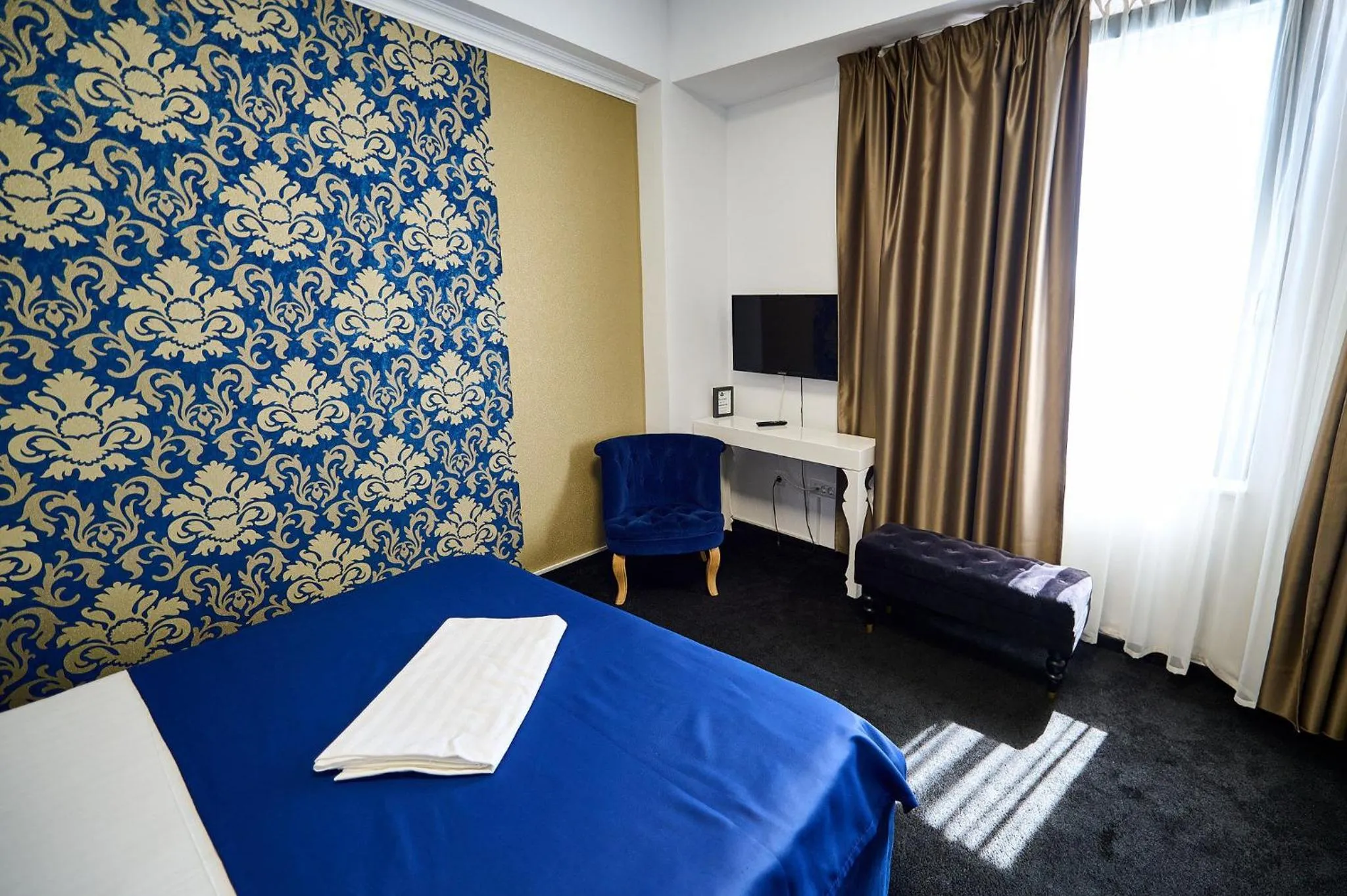 Bed in Hotel Evianne Boutique