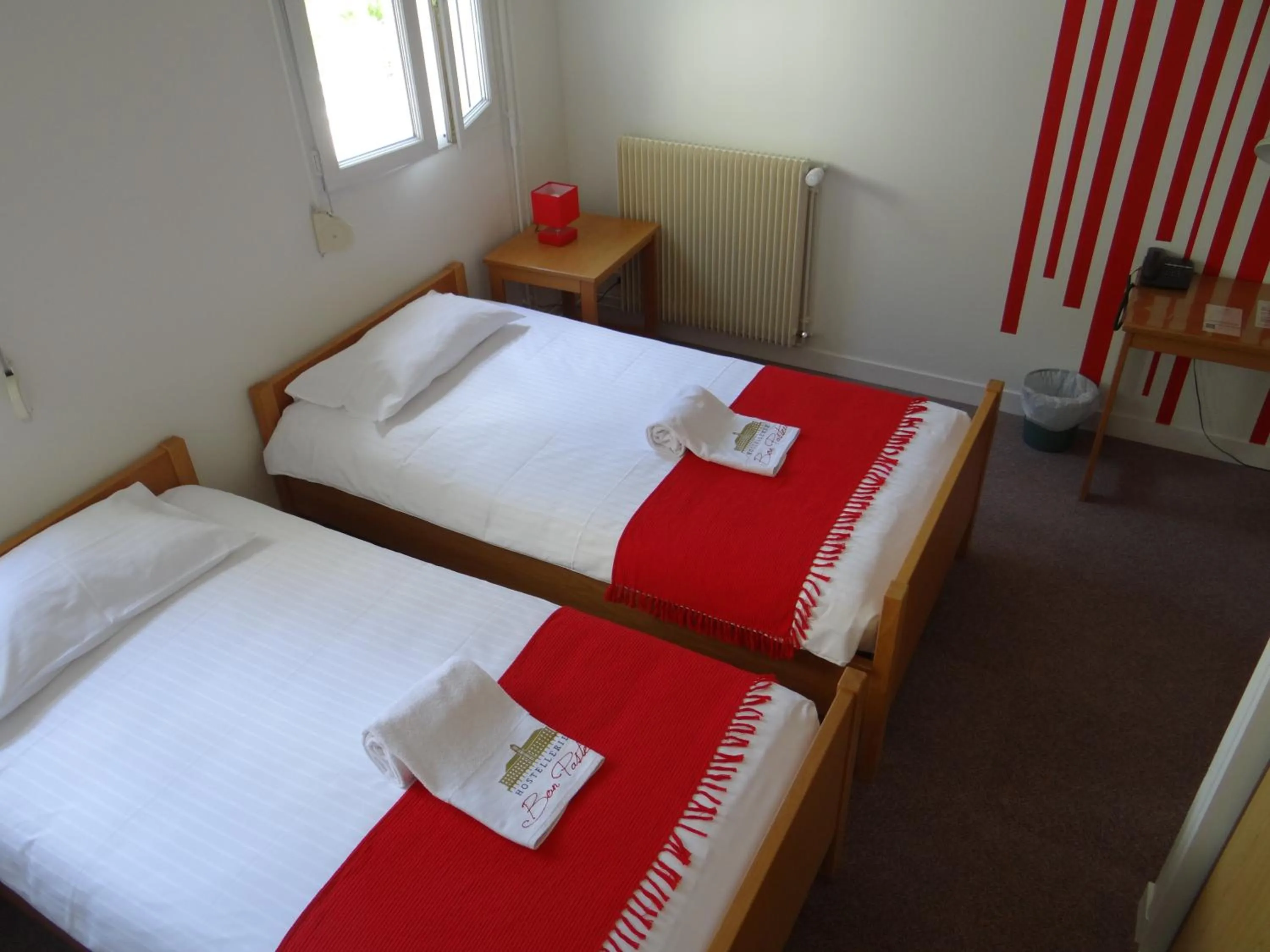 Bedroom in Hostellerie Bon Pasteur