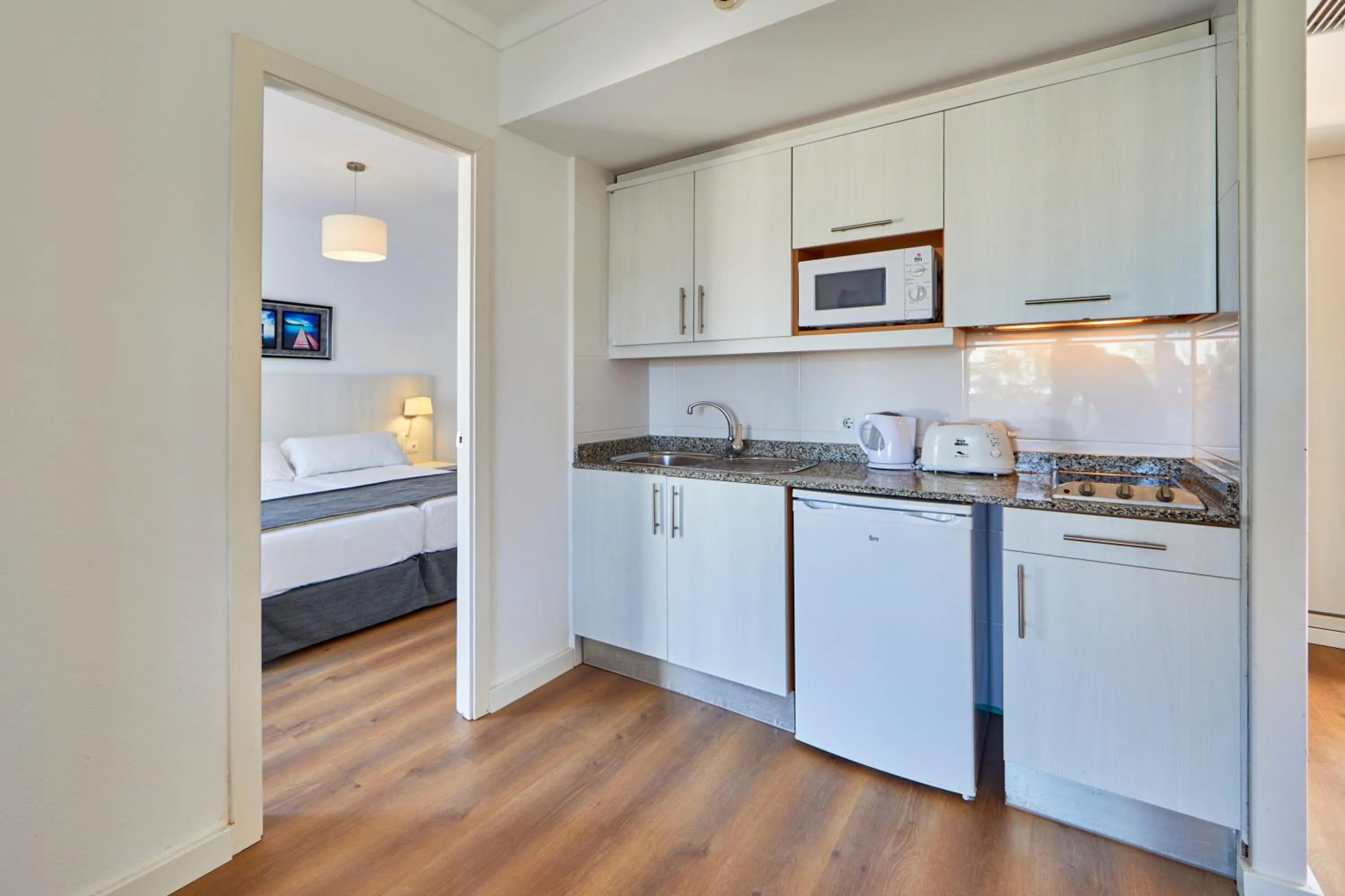 Kitchen or kitchenette in OLA Apartamentos Cala d'Or