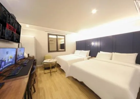 Bed in The Stone Bridge Hotel Sasang