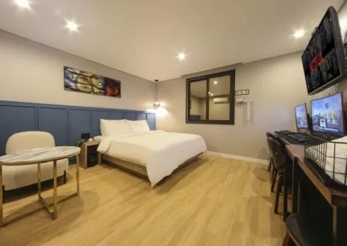 Bed in The Stone Bridge Hotel Sasang