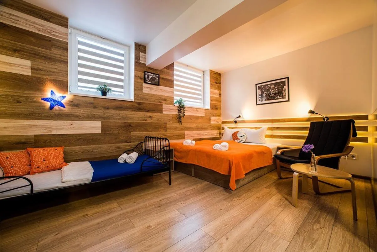 Bed in Fox Rooms Aparthotel