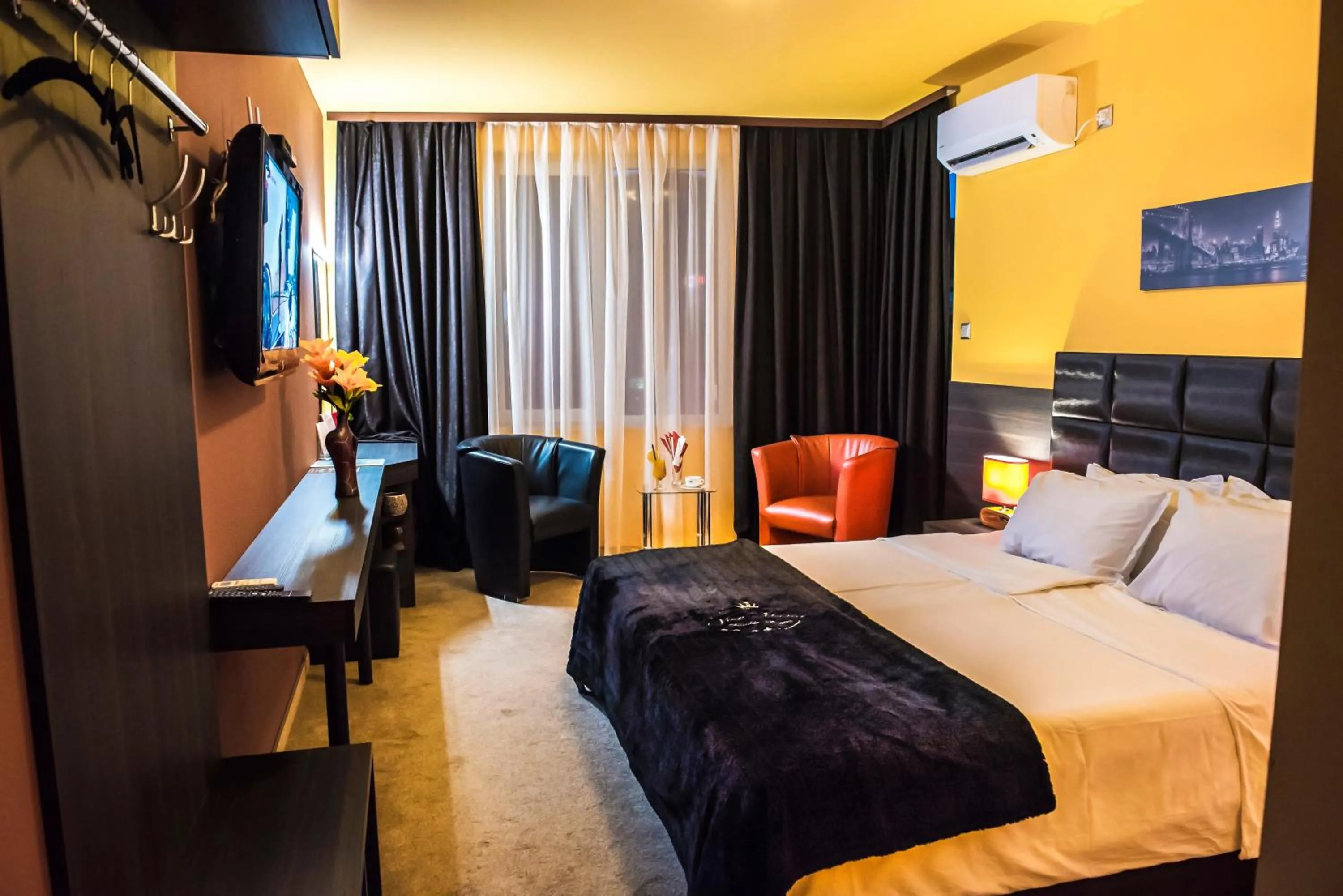 TV and multimedia, Bed in Central Guest Rooms
