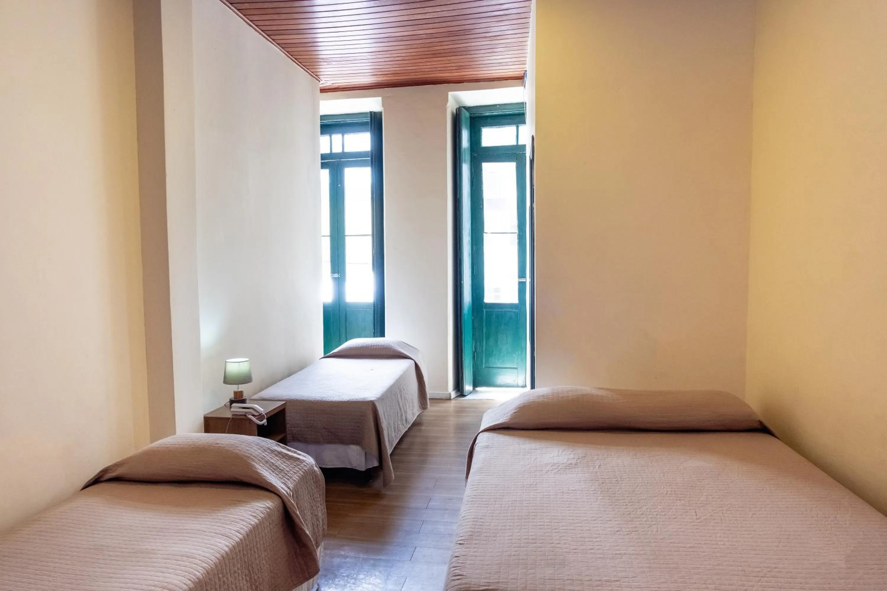 Bed in Pousada Colonial Chile