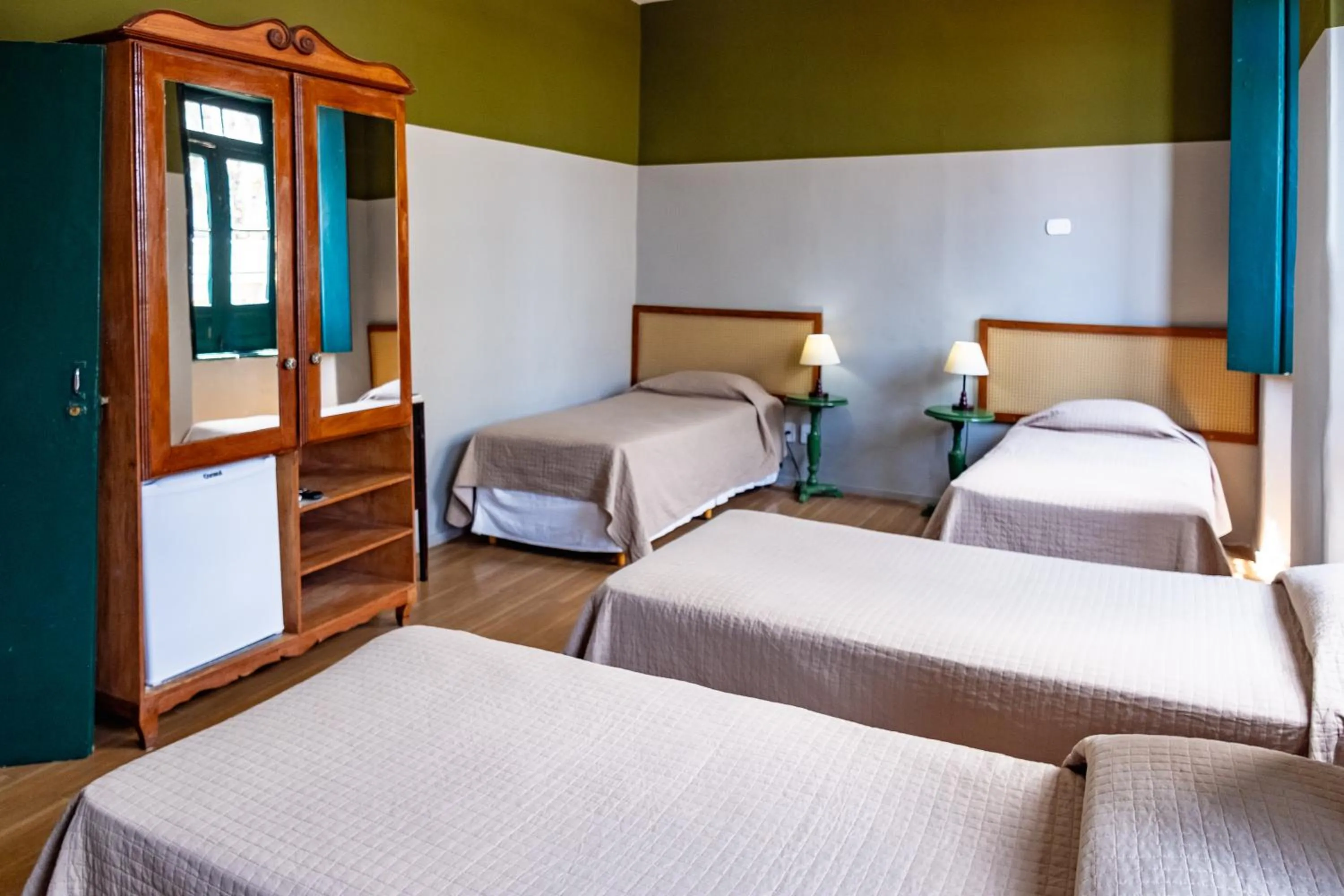 Bed in Pousada Colonial Chile